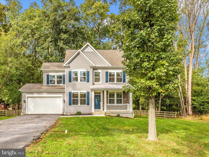 Welcome to 12328 Timber Grove Rd.  Situated on over .50 acres, this beautiful colonial is ready to be your new home.  The main level features a large study with built in book shelves, dining room, open concept family room that flows smoothly into the gourmet kitchen and flex space, and a half bathroom.  The upper level has a large primary bedroom with 2 walk in closets and an en-suite full bathroom.  Rounding out the upper level are 3 more guest bedrooms, another full bathroom and the laundry room.  The lower level has a large open space for a 2nd family room, another full bathroom, an office/exercise room/ possible 5th bedroom, and the utility room.  The rear of the home has a large composite wrap around deck and a fully fenced yard that backs to woods.  Do not miss your opportunity to see this home, it won't last long.