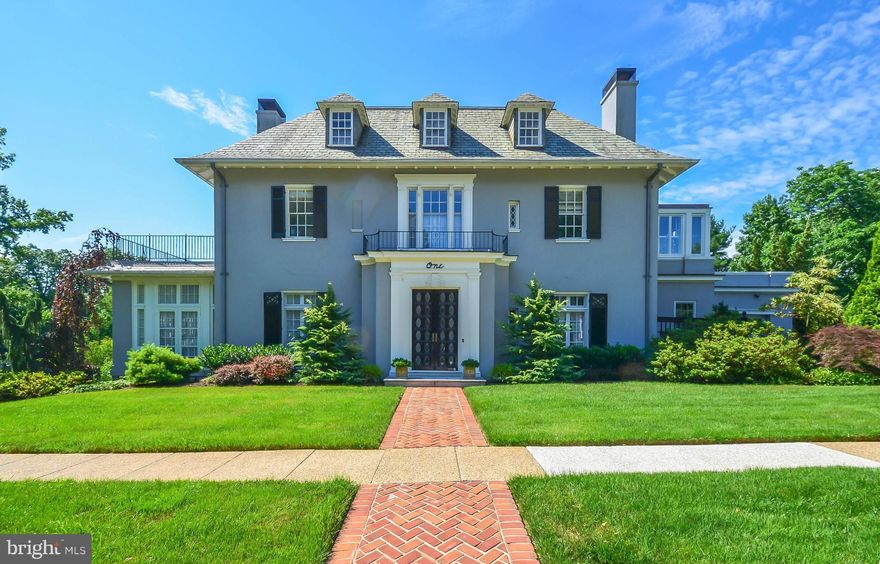 Meticulously maintained & restored 6BR Georgian w/grand proportions & old world details-Situated on .76 acres w/over 100 specimen plantings, abuts "Sunken Park"-Kit w/granite ctops & SS appliances, Vulcan range, Brazilian cherry flrs-Master suite w/FP, sun porch & Carrera marble BA-39' rear porch w/beaut views-4 FP's-Lower lvl club rm w/FP & stone walls-2 car gar w/off St pking-Zoned heat & CAC.