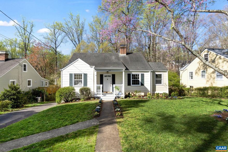 Picturesque 4 bed, 2-3 bath expanded cottage tucked away in established neighborhood RUGBY HILLS just a moment's walk to Greenleaf Park + 5 mins drive or bike ride to UVA + Downtown. Curb appeal abounds! A covered entry porch flanked by gardens full of bulbs greets you. Inside, the main living area feat. a wood-burning fireplace, built-ins, gleaming hardwood floors + lovely natural light from the many windows. Excellent ONE-LEVEL LIVING option w/ 3 beds/2baths on the main level. Primary bedroom suite addition w/ deck access overlooks beautiful trees + backyard. The bright terrace level offers an additional bedroom, living space + ample storage to expand into. Enjoy SERENE OUTDOOR spaces from brand-new deck + private backyard perfect for play, gardening + more. TING fiber internet avail!,White Cabinets,Fireplace in Living Room