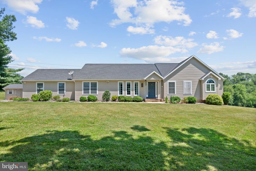 Don't Miss Your Chance to See this Private Property Now Available in the Quiet Community of Parkton - Rancher w/Walkout Basement Level Offers Plenty of Space to Enjoy.   Sitting on Just Over an Acre of Land.  Main Floor Provides Everything on 1 Floor --4 Large Bedrooms &  2.5 Baths all Updated and Ready for You to Make Your Own!  Family Room sets just off the Beautiful Kitchen & Bonus Rear Sun Room that Overlooks the Peaceful Setting and Views.  Laundry Room on Main floor  for Convenience and  Walk In Closets/Private Master Suite Deck to Enjoy...
The Huge Unfinished Open Basement offers Plenty room for storage or to Finish off for Additional space if needed.  Nestled Back off this Court Boasts Ultimate Privacy and Comfort Style Living to be Yours.  Schedule your Showing Today!