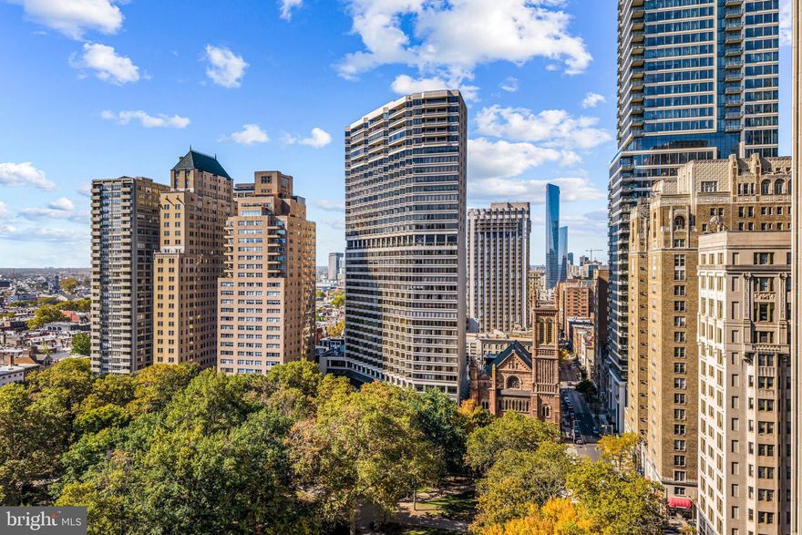 The Rittenhouse Hotel & Residence is located on Rittenhouse Square – the most sought-after address in Philadelphia. Known for its luxury and exclusivity, as a resident, you will have unparalleled access to high-end amenities. This stunning property at Unit 2105 is perfectly positioned on the 21st floor, offering breathtaking wrap-around views of the iconic Rittenhouse Square, Boathouse Row, Walt Whitman Bridge, the Schuylkill River and The Art Museum. The interior has been meticulously updated and crafted by renowned Mark Showell Interiors, resulting in a unique, one-of-a-kind space.

The decagon-shaped grand foyer welcomes you into a realm of luxury that permeates every corner of this home. The tiger maple detailing flows from the entryway through the entertaining spaces. The tiered-tray ceilings in the living and dining areas are expansive, with high-gloss black absolute granite floors that amplify the natural light streaming through large windows. These spaces not only offer stunning views but also feature custom built-ins that enhance functionality. The kitchen is a masterpiece crafted by well-known designer, Joanne Hudson. The space is equipped with granite countertops, a custom butcher block countertop, a top-tier Gaggenau double oven, a convection cooktop and hood, and a Sub-Zero refrigerator and beverage cooler. The ceramic tile backsplash adds a stylish touch. 
The primary suite is exceptionally spacious retreat with tiered tray ceilings that elevate the room’s elegance. It includes a cozy sitting area ideal for enjoying the city's sunsets. 
Further enhancing this home is a dedicated office space with built-ins, perfect for working from home. With natural light and more city views, it is a delight to work here. Additionally, the entire unit is equipped with a state-of-the-art Savant system, allowing voice-controlled operation of lighting, blinds, and the surround sound system, ensuring convenience and a modern living experience. (See the attached info sheet that provides more in-depth information on the Savant system.)
Residents of The Rittenhouse Hotel & Residence have access to an array of upscale amenities including a 24/7 concierge, an on-site health club, a salon, luxury town car service, a swimming pool, and comprehensive room service. Additional services such as dog walking, housekeeping, and multiple dining options make living here a truly luxurious experience. Residents enjoy 25% off amenities like the spa and on-site restaurants and lounge. Positioned amidst fine dining, exclusive shops, and rich cultural venues, this property offers unparalleled sophistication and a prestigious lifestyle in the heart of Philadelphia. Experience the pinnacle of urban living at The Rittenhouse Hotel & Residence. Seller will pay for 2 valet parking spaces for one year with an acceptable offer.
Some photos are digital renderings.  Contact agent for more details.