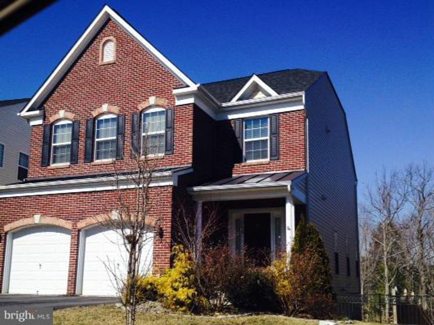 Appraisded for $450,000. This home has, granite, stainless hardwoods, security system, underground sprinkler front and back, iron fenced yard, and deck overlooking tree's!  Large bedrooms, laundry ustairs, full finished walkout basement w/rec room, den,  a  full bath,  & storage rooms! Owners motivated for quick sale.