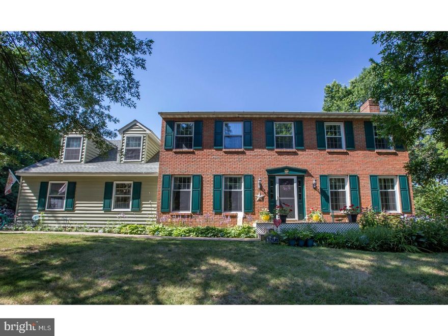 Beautifully maintained and updated just outside downtown Perkasie Borough, this 5 bedroom home has been expanded and improved and offers a bonus main-level bedroom suite with separate entrance, great for first floor master, in-law suite, or private home office.  Convenient first floor laundry is right off the expansive back deck overlooking the pool, perfect for soaking in the summer sun and entertaining.  The open kitchen includes an oversized breakfast room adjacent to formal dining and large living room with fireplace and built in cabinetry.  Upstairs an equally well-sized master suite with en suite updated full bath and multiple closets, plus three additional bedrooms.  The finished lower level is great for a game/TV room and has a ton of unfinished space for storage and walk-out door.  Convenient to town and major roads, with tons of flexible space.  Seller is offering a one year   Home Warranty to Buyer.