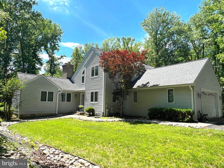 The military is relocating this amazing household, and they are hoping to find the perfect people to love their home as much as they have. Nestled within the serene Tall Oaks neighborhood, this exceptional single-family residence offers an unparalleled living experience on a sprawling 2.27-acre estate. Boasting five generously sized bedrooms, including two luxurious master suites with private bathrooms, and a total of 3.5 well-appointed bathrooms, this home provides ample space and comfort. One of my favorite features is one of the master's is on the main level with an office nook and a bathroom right out of a spa. Wide stairways enhance ease of movement throughout the property. When you move enough you learn how great this feature is. Enjoy a year round sunroom just off the kitchen and take your meals and gatherings there. This is the perfect room for crab picking! The finished basement features a recreational pool table centered in the room that also features a great bar area. The bar boasts a wall mounted TV, a sink, and a mini fridge. For added peace of mind, a gas-powered generator is installed to power the entire home during outages and a high-end water filtration system ensures great water quality. .. Outdoors, residents can enjoy a private in-ground pool with secure fencing and explore private trails leading to a tranquil creek. The yard is fairly flat and is perfect for a firepit and outdoor games. A spacious deck offers an ideal setting for outdoor relaxation and entertaining. Out front is a mature Koi Pond full of fishies to feed throughout the season. Ideally situated for commuters, this quiet neighborhood provides convenient access to Andrews Air Force Base, Annapolis, and Washington D.C. The monthly rent for this remarkable property is $5000, and pets will be considered. Preferred lease terms are 1 to 2 years.