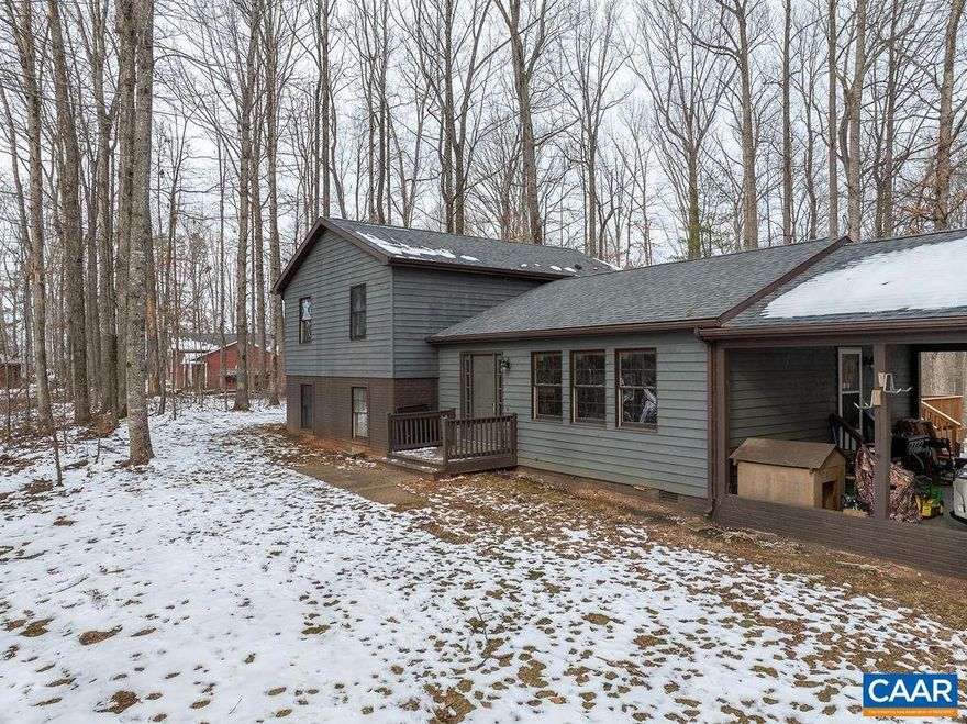 Enjoy this private and well maintained home with seasonal mountain views.  Minutes to 29, for an easy commute to Greene, Cville or Culpeper.  Home has been updated to include new appliances, backsplash, cabinets w/under lights, and flooring in kitchen.  New 20 x 20 composite deck off dining room with a patio off basement door.  Sit by the firepit for a night cap or watch wildlife.  Recess lighting was added to main level.  New front door and roof was replaced in Summer of 2023. Upstairs has new floors, bathroom cabinet, fixtures and flooring throughout.,Fireplace in Den