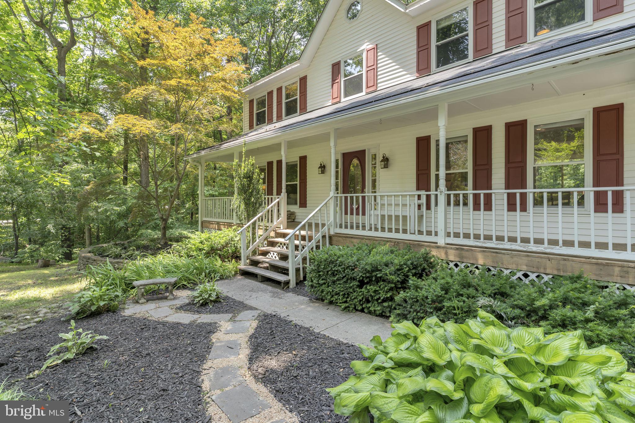 Discover the perfect blend of comfort and charm in this spacious 4-bedroom, 2.5-bath home, ideally located just minutes from the picturesque shores, dining, and amenities of Chesapeake Beach. The front porch features an adorable wooden bench, perfect for sitting and watching the neighbors stroll by. Ground level offers a traditional floor plan, with a center staircase flanked by two spacious living areas as well as an ample kitchen. Karen Drive has a new roof (<5 years) with transferable warranty to new owners as well as recently serviced HVAC. The upstairs offers a full bathroom with four bedrooms - with center hallway washer/dryer for ease of use and maintenance for living. Previous owners used basement as a utility space and workshop - but the utility sink and expansive work area present a multitude of options and uses! Walk-out basement allows homeowners to enjoy another level of their backyard. Come view your new home today!
