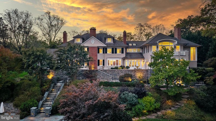 Live authentically. Located in the heart of Ruxton. Circa 1903. Relish the drive home through whispering woodlands. A refuge of tranquility awaits. Immerse yourself in the boundless beauty that unfolds. Extensive expansion by renowned architect Patrick Sutton and Winchester Construction Builders. Abundant windows invite radiant light throughout, while eight fireplaces punctuate the home, each a warm centerpiece of comfort and elegance. Your inner chef will flourish in the cooking space where the soul and senses entwine. The glamorous owner’s suite is a private sanctuary of calm and refinement. Fully finished lower level. Sweeping patios and porches stretch outward, seamlessly blending indoor and outdoor living. An expansive 81 ft. bluestone terrace invites unforgettable alfresco dining beneath the open sky. Surrender to the lush embrace of thriving gardens as you merge effortlessly with the outdoors. Savor every sunrise, then let your body flow through the sparkling embrace of the sublime pool. Recharge in the ambiance and let your energy be restored. Each scene awakens the senses, like a painting brought to life. The landscape becomes a living canvas, ready for the next chapter of your life. Verizon Fios Internet. Cultivate your existence. The art of uniting human and home.