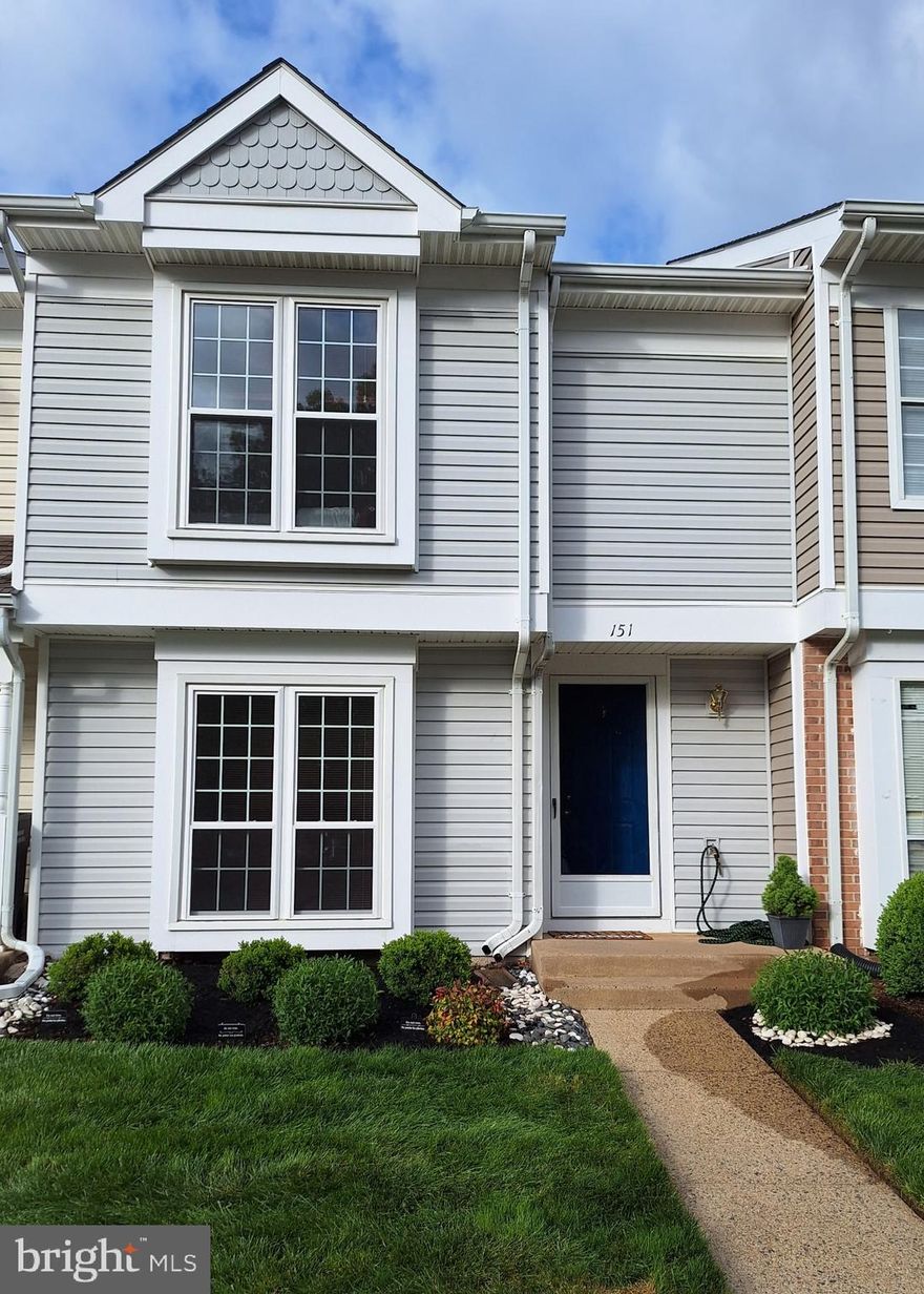 Come visit and be amazed at this impeccable, light filled, and beautifully  renovated 3 bedroom, 1.5 bath, 2 level townhouse where no expense has been spared!  

Located in Providence Village, a cozy enclave of townhomes in a fantastic location, between Routes 7 and 28, close to the Dulles toll road, it is also within walking distance to many restaurants and cafes, a vast variety of shopping opportunities, local schools, churches, parks, even a Post Office and a DMV nearby. 

The bright, open layout includes spacious living and dining areas.  The kitchen features new stainless steel appliances, granite countertops, and opens to a lovely dining room with a beautiful slate fireplace.  A sliding glass door leads to a private, fenced and gated back deck. Along one wall of the deck is a spacious storage area with a new door.  

Among the many  updates are luxury engineered plank wood flooring throughout the main level, plush newer Shaw carpeting on the stairs and throughout the second level bedrooms and hallway, and updated bathrooms with new Kohler mirrored medicine cabinets. The front facing windows have been replaced. There is a new Trane energy efficient heating and air conditioning system. The top-quality stacked washer and dryer are full size.  The house shines with new paint, even the inside of the deck storage area was painted!  
There is attic access in the upstairs hall with pull down steps. 
There are two reserved parking spaces, both numbered 467. 

The very reasonable monthly condo fee covers exterior maintenance including mowing the front yard,  common area landscaping, trash pickup, snow removal, tot lots/playgrounds, and even roof replacement when needed.  The current owner landscaped the front yard with beautiful shrubbery and decorative touches. 

This move-in ready bright and light filled home combines updated finishes with everyday convenience in a welcoming neighborhood.  Call for your appointment today!