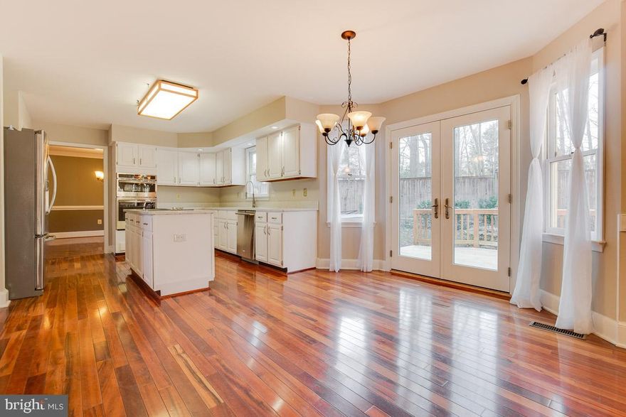 VERY MOTIVATED SELLER SAYS BRING ALL OFFERS!!Beautiful Updated Brick Front Colonial with New Quartz Kitchen Counters, Stainless Appliances, New Hot Water Heater, Hardwoods throughout, two story foyer all on 1.19 acres.  The home includes a large full finished walk out basement, large dry bar, side load 2 car garage, fireplace and many upgrades. Easy access to everything!!