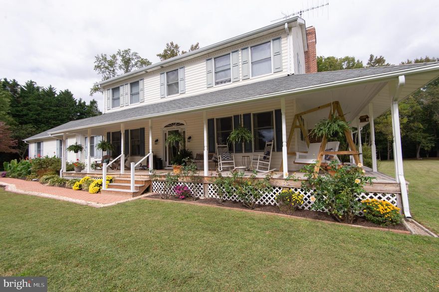 Nestled in the shadows of the Choptank River is a meticulously maintained home in the water-privileged neighborhood of Asbury. Expansive lot sizes give you the privacy needed within a walkable neighborhood. Sit in your rocker with a cocktail while enjoying the dream turned into a reality of a wrap-around porch.  A large rear screened-in porch to watch the local wildlife opens onto extensive hardscaping,  perfect for an outdoor fire pit to enjoy those cool evenings with family and friends.  Large open kitchen into the family room is the heart of the home that features a wood stove. 4 substantial bedrooms upstairs. Main floor features an office that could be a wide range of things, including a main floor bedroom. Steps from the Asbury Nature Trail that brings you to your community dock and water access with Huge views of the Choptank River.