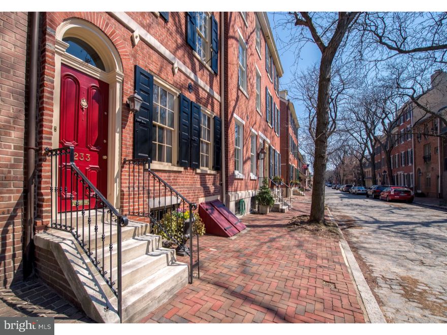 Joseph Wetherill House (c. 1800-10).  One of the most intact Federal homes in Philadelphia.  Perfectly-sized, historically significant home with spacious brick patio & garden and 1-car on-site deeded PARKING.  Beautifully updated and maintained, with incredible Historic character and detail throughout.  All on one of the nation's most beautiful and desirable Historic tree-lined, cobblestone blocks.    5 bedrooms, family room, 2.5 baths.  High ceilings, wood burning fireplaces with 4 rare, historically significant Wellford mantelpieces (Very valuable on their own).  With perfect proportions and a wonderful layout, this home served as a long-time home for a family of 5, yet it is not oversized and it also presents a flexible layout to meet many needs and family stages and sizes.  Second Floor Master Suite.  Original Random Width Pine Floors throughout (Wetherill owned a lumberyard that supplied lumber to for the building of Independence Hall).  Pennsylvania Bluestone fireplace surrounds (this stone also used in Independence Hall).  Original chair rails, wainscoting, and crown moldings throughout.  Original staircase with 4-story mahogany handrail.  Bright eat-in kitchen with big windows overlooking the beautiful landscaped patio.  Tremendous light from big south-facing windows.  Lovely light fixtures.  Superb closets and storage throughout.  The deeded parking spot is immediately outside your patio door--in a secure lot (Spaces in this lot are virtually never available, and are almost considered priceless!).  The ideal Philadelphia location, on a Historic cobblestone block with mature trees.  Within blocks of Headhouse Farmers Market, the best restaurants, shopping, supermarkets, Ritz Theaters, Three Bears Park, and all that Center City has to offer. 98 Walkscore.  And all on a prime block in one of the best neighborhoods anywhere! The PARKING, literally 10 steps from your garden door offers unparalleled convenience.  Just a special, Important home.  Note-Robert Wellford is the most well-known makers of American composition ornament.  These 4 mantles have been appraised at well over $100,000.  This home was designated to the original Philadelphia Historic Register in 1957. Listed Sq. Footage from 2015 floor plan survey.