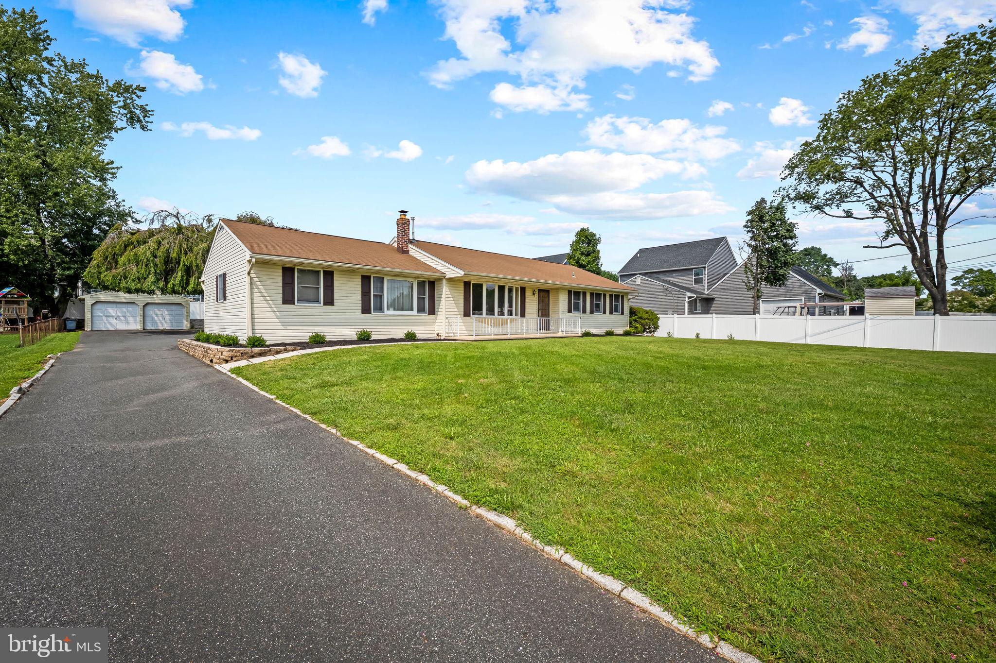 Welcome to 100 Mountain Rd – a charming 3-bedroom rancher nestled in the heart of sought-after Fallston! From the moment you step inside, you’ll notice the freshly refinished hardwood floors that add warmth and shine throughout the main living areas. This classic floor plan offers both function and charm, with spacious rooms and thoughtful touches throughout. The kitchen is light and bright, featuring Corian countertops, a convenient prep island, wall oven, and a view that overlooks the flat backyard—perfect for entertaining. Step outside to enjoy a spacious deck and a cozy fire pit area, ideal for cool evenings and weekend gatherings. Each of the three bedrooms offers generous space and natural light. The walkout basement is currently unfinished and full of potential—double your square footage with the space of your dreams!
Sitting on just under a half-acre, the freshly landscaped yard offers room to play, garden, or simply enjoy the outdoors. Parking and storage are a breeze with both an attached 1-car garage and a detached 2-car garage. The oversized driveway allows for easy turnaround, making entry and exit onto Route 152 stress-free—especially during inclement weather when roads are cleared quickly. Additional highlights include: Well & Septic currently in use, but public utilities available for hook-up! Wired for generator plug-in. Fantastic Fallston location with convenient access to local amenities. Don’t miss this opportunity to own a move-in-ready home with room to grow, in a location that’s hard to beat!