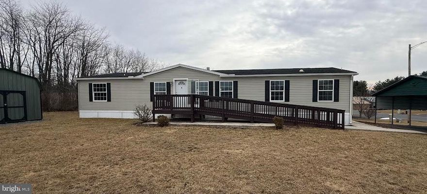 Located in a Small Country Development of Maizefield is this Large 2014 Champion Double Wide Home.  This has very open floor plan and large living areas.  Offering 3 Bedrooms, 2 Full Baths, Eat-In Kitchen, Laundry Room, Living Room with Fireplace, 3 Decks/Porches, Large Ramp, Oversized Shed and a Carport.  The Lot Rent Includes Sewer & Trash.  Some Pet Restrictions Apply.  Park Approval Needed!  SCHEDULE YOUR PRIVATE TOUR TODAY!!!