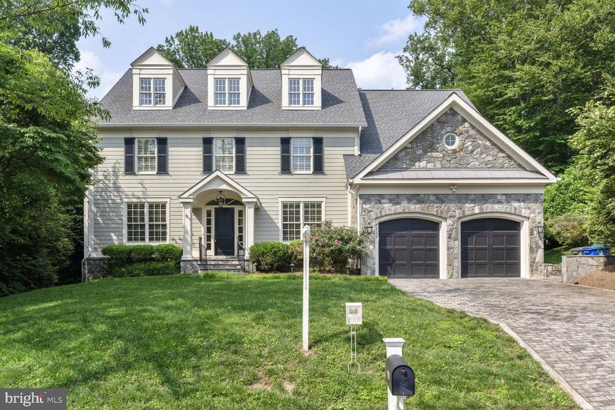 OPEN SUNDAY JULY 20TH 2-4PM ** INCREDIBLE PRICE for this stunning custom-built home by Monarch Custom Homes is a true masterpiece, offering approximately 7,500 square feet of luxurious living space across four finished levels. Built in 2013, this home feels brand new and is situated on a rare, hard-to-find .48-acre lot on a quiet street just across the bridge from Washington, D.C., right along the Potomac River bike trail nestled in one of Arlington's most sought-after school pyramids.<br/><br/>

From the moment you arrive, you'll be captivated by the handsome curb appeal, complete with beautiful landscaping and a welcoming flagstone front walk leading to a portico entry with a charming gas lantern. Inside, the light-filled floor plan boasts 9-foot ceilings on three levels, wood floors, exquisite trim and baseboards, and over $250,000 in designer features.<br/><br/>

The main floor includes a formal living room with bay window, built-in shelving, recessed lighting, and custom window treatments. The formal dining room is equally impressive, with custom shutters and a Butler’s pantry that connects to the spacious open kitchen. Here, you'll find an oversized marble-topped island, granite countertops, tile backsplash, stainless steel appliances, and even two paneled dishwashers. French doors lead to the backyard, perfect for entertaining or simply relaxing in the private, tree-lined yard.<br/><br/>

The family room is cozy and inviting, with a wall of windows overlooking the backyard and a wood fireplace with a gas rough-in and a stone surround. The main level also features a mudroom with built-in cabinets and access to the two-car garage, which is finished with recessed lighting.<br/><br/>

Upstairs, the primary bedroom offers a wood fireplace, luxurious primary bath with marble floors, soaking tub, separate shower, and a stunning custom dressing room/closet. Two additional bedrooms on the second level each have private baths and walk-in closets, while the upper-level recreation room is the perfect space for an office, home gym, or bedroom suite with its own bathroom and walk-in closet.<br/><br/>

The lower level is equally impressive, with a recreation room featuring a cozy gas fireplace, built-in television projector, screen, and surround sound. There's also a wet bar with a marble top, beverage fridge, and a private guest bedroom with its own bath. For added convenience, the lower level includes a large utility/storage room and a powder room. Walk-out access leads to a flagstone patio, making outdoor entertaining a breeze.<br/><br/>

Enjoy relaxing on the Trex deck off the kitchen, or spend time in the wonderful, private backyard, surrounded by trees and open space. With easy access to the Potomac River and just minutes from downtown D.C., this home offers an unbeatable combination of location and luxury.<br/><br/>

Don’t miss out on this rare gem! The owner is also open to selling the home fully or partially furnished, making it even easier to make this spectacular property your own.