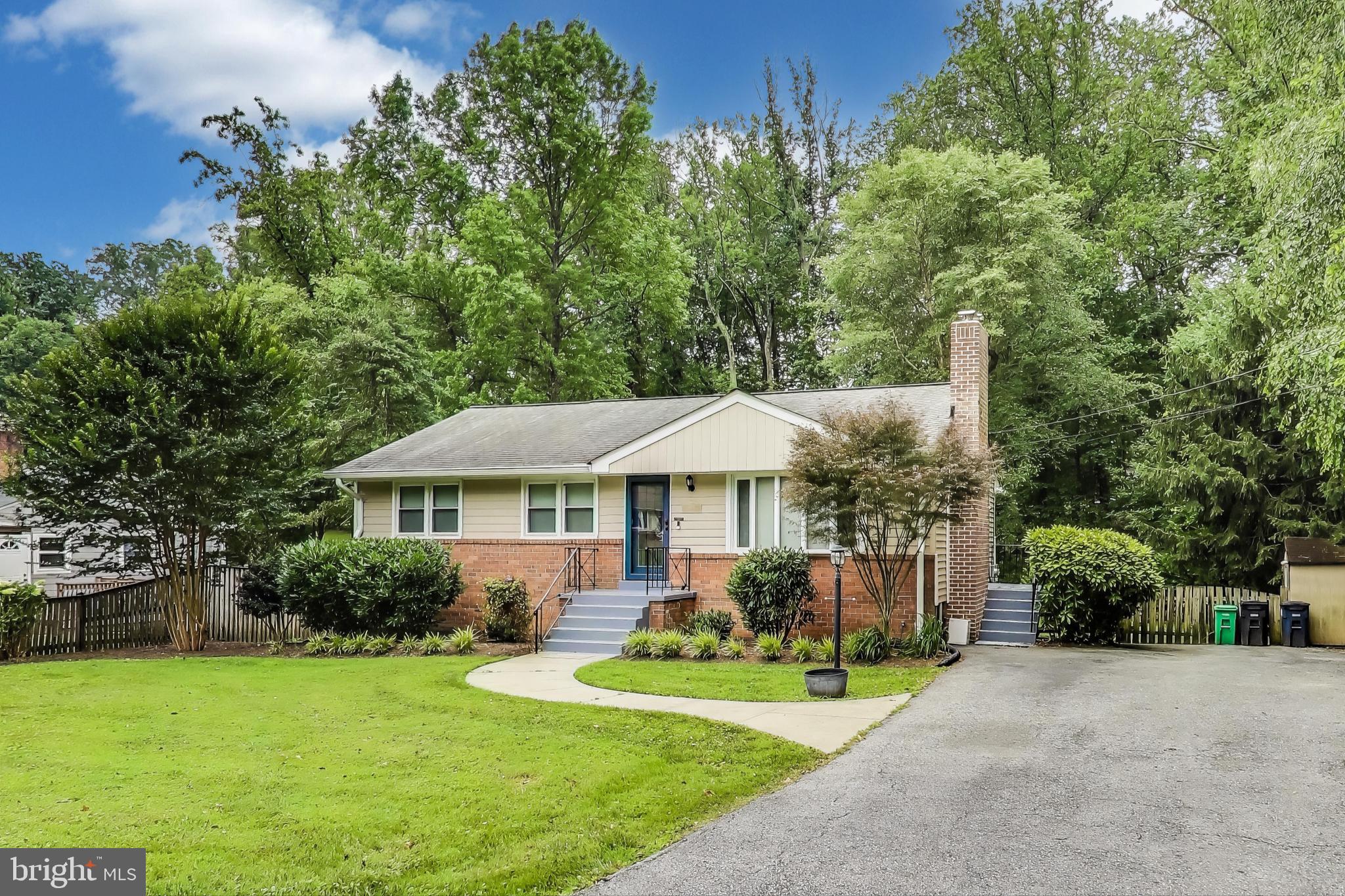Perfect on Parkway --- Gorgeous, fully Updated, 3 + Den/office, 3 Full Bath Rancher in West Laurel. This home sits on a .53 acre lot and back to Trees & Creek. Features an updated kitchen with stainless steel appliances and hardwood floors throughout 1st floor. Boasts a spacious living room with decorative fireplace, built ins and beautiful bay window adding space and natural light! Large dining room area with access to a huge deck. Three entry level bedrooms and a two full baths complete this level. Lower level features built ins, a large recreation room with bar area including wine fridge and freezer, full bath, large office, den/sitting area with outside exit. Open side porch and shed perfect for storage! Driveway can fit 4+ cars!