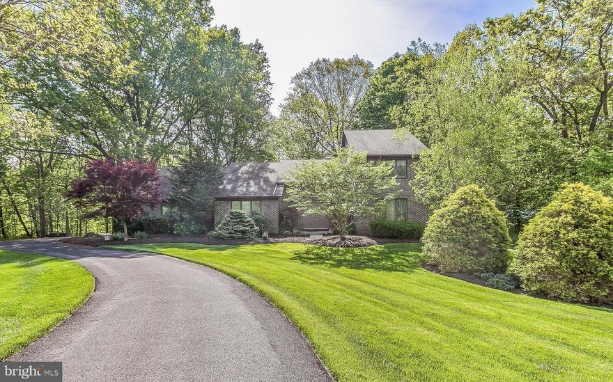 In immaculate condition, this Valley Brook contemporary charms & delights! A soaring cathedral ceiling greets you in the Foyer and provides a sight-line directly out to the deck and lush tree canopy. Offering a spacious updated Kit, lg First Floor MSuite w/ huge Dressing Rm, beautiful upper level baths, custom closet organizers & gracious proportions thruout. On a gorgeous, peaceful 1.6 acre lot.