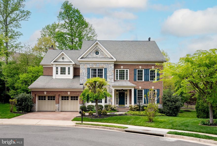 Welcome to your new luxury home, located on a cul-de-sac in the coveted Pickett's Reserve community of Fairfax, Virginia. 

This stunning center hall colonial home features 5 bedrooms and 5.5 bathrooms with 5,821 square feet on 4 fully finished levels. 

3552 Early Woodland Place is certain to impress today's most discerning buyer with its spacious chef's kitchen, 4 gas fireplaces, expansive rear deck, extravagant great room, stately built-ins and high end finishes. With valuable home renovations worth over $45,000, no details were spared within the home.

As you approach this magnificent home, you will be captivated by its all brick and natural stone exterior. With a well-manicured, lawn sprinkler system and vibrant landscaping, you will be enthralled by the beautiful curb appeal. 

Entering the home, you are greeted by a grand foyer with high ceilings, elegant chandelier lighting and gleaming hardwood floors that flow seamlessly throughout the main level of the home. The main level features the gourmet kitchen, formal dining room, living room, extravagant great room, and home office. The living room features crown molding, wainscoting, and chair rail detail with recessed lighting. Highlighted by a gorgeous bay window, the dining room exudes sophistication and opulence with crown molding, wainscoting and chair rail detail. French doors welcome you into the home office, which features a bay window, 1st gas fireplace and prominent built-ins.

The gourmet kitchen is a chef's dream with stainless steel appliances, granite countertops, wrap-around island, wall oven, convection microwave, dual sinks, gas cooktop, top-quality 42" cabinets and a butler's pantry. The stainless-steel refrigerator was purchased in 2022. Every buyer's dream is to have a great room within view of the kitchen. This great room is the crowning feature of an extravagant home. Framed by traditional columns, the room is illuminated by natural light streaming in through the several floor-to-ceiling windows. This room features the 2nd gas fireplace with mantel, surround-sound, a built-in entertainment center and a gorgeous view of your rear deck and backyard. 

French doors from the kitchen lead to the rear deck, which expands across the entire back of the home, providing a fantastic space for summertime BBQs, entertaining guests and enjoying the privacy of your new luxury estate. From the center hallway, you will find an additional entry point for the rear deck. The rear deck has a staircase that leads to the sprawling backyard and surrounding wooded views. There is a gorgeous shady area submerged in nature with a fire-pit, providing the perfect space for intimate gatherings with family and friends and simply unwinding after a long day.

The upper level features 4 bedrooms and 3 full bathrooms. The primary suite provides you with the luxurious escape you deserve with the 3rd gas fireplace to keep you warm on brisk winter evenings, an extravagant ensuite bathroom and dual walk-in closets. The ensuite bathroom features a large glass shower with waterfall shower head, dual vanities and lavish contemporary soaking tub. The 2nd bedroom on this level features its own walk-in closet and ensuite bathroom. The additional two bedrooms are spacious and are served by the 3rd full bathroom on this level. 

The top level is the hidden gem within the home. This level features a loft area, 5th bedroom addition made by the current owners, and 4th full bathroom. The loft area could be used as a craft room or art studio. 

The fully finished walk-out lower level features a recreation room with the 4th gas fireplace, large fitness studio, the guest room/6th bedroom and 5th full bathroom. The recreation room features recessed lighting and surround-sound. It's the ideal space for watching movies and hosting game nights. The guest room/6th bedroom has a large walk-in closet and is served by the full bathroom on this level.

Look no further; you are home!