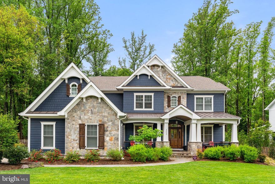 Immerse yourself in unparalleled luxury living in this masterpiece by Cloud IX Homes. This custom-built residence nestled on a tranquil street sprawls across four floors, offering over 8,100 square feet of living space. Boasting 8 bedrooms and 7.5 luxurious bathrooms, exquisite details are evident throughout, from the gorgeous crown molding to the seamless integration of a Sonos sound system that fills the home with immersive audio. Park your vehicles with ease in the rarely seen, oversized 3-bay garage before stepping into a world of comfort and sophistication.  The grand foyer welcomes you to a light-filled open floor plan. Soaring ceilings and a coffered design create an opulent atmosphere.

A gourmet kitchen awaits your culinary creations. Featuring top-of-the-line stainless steel appliances, a massive quartz center island perfect for meal prep, and a spacious walk-in pantry, it's a chef's dream. Custom cabinetry provides both beauty and functionality. The kitchen seamlessly flows into inviting living areas, creating an ideal space for both entertaining and daily life. For more formal occasions, a grand dining room provides an elegant backdrop for memorable meals. Also on the main level, two private offices offer a quiet refuge to work from home. One office features versatile space, including a full bathroom next door and closet, allowing for easy conversion to a comfortable guest room or additional bedroom.

Upstairs, find serenity in the four spacious bedrooms, each a private retreat. The master suite, a true oasis, awaits you. Unwind in a spa-inspired bath, then retire to your oversized, custom-designed his and hers walk-in closets – a haven for any wardrobe. The remaining three bedrooms offer ample space for family or guests, each accompanied by luxurious bathrooms and walk-in closets for ultimate convenience. This level includes a large laundry room with custom built-ins, countertops, and two Electrolux washers and dryers.

But wait, there's more! Ascend to the fourth level and discover a spacious and light-filled loft area that provides a perfect multi-purpose space - ideal for a playroom, media room, and more. Utilize the bonus storage area for convenience. An additional bedroom with a full bathroom completes this exclusive sanctuary.

Descend to the lower level, designed with entertainment and wellness in mind. Unwind in the enormous recreation room, challenge friends in the custom-built game room, or gather around a well-stocked bar featuring substantial wine storage and quartz countertops. For those seeking a dedicated fitness area, the lower level also boasts a fully-equipped gym. Or, for moments of relaxation, curl up with a movie in the inviting media room. An additional bedroom and a full bathroom complete this versatile lower level, offering plenty of space for entertaining and guests.

Outdoors, extend your living space to the beautifully landscaped exterior. Relax on your private patio overlooking the spacious, flat, fully fenced backyard surrounded by lush greenery to ensure privacy. Host memorable gatherings on the expansive deck, complete with a built-in grill, or find year-round tranquility on the magnificent screened-in porch, warmed by a stone fireplace.

Beyond this masterpiece of a home, embrace a vibrant community. The Westwood Country Club is a short stroll away, featuring high-end dining, swimming, tennis, fitness, and a stunning golf course. Vienna's charming shops and restaurants are also within walking distance.  In the Madison High School Pyramid & Vienna Elementary. For those seeking the excitement of city life, Tysons Corner with its upscale shopping malls and diverse dining options is a short drive away. This rare opportunity is also a commuter's dream, offering easy access to Chain Bridge Rd, I-495, the Dulles Toll Road, I-66, Orange and Silver Line Metro Stations, Tysons Corner, Maryland, and Washington D.C. Don't miss this opportunity to own a piece of Vienna's finest real estate.