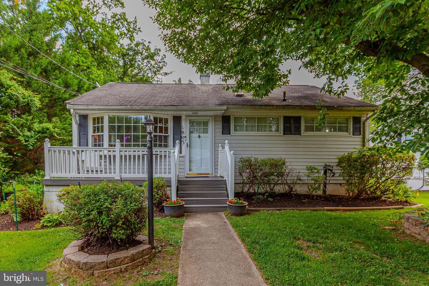 SIGNIFICANT PRICE REDUCTION! DON'T MISS THIS OPPORTUNITY TO OBTAIN A MOVE IN READY HOME AT AN AMAZING PRICE! - Truly an exceptional value in the heart of Rockville! This beautiful Rockcrest rambler sits on a private lot and includes many attractive features and thoughtful updates throughout! A spacious main level holds a  relaxing living room, three sizable bedrooms, a recently updated full bathroom, and an open concept, and a gourmet kitchen that opens to a large dining area addition with access to a private deck! A fully finished, walk-out lower level holds a cozy family room with elegant built in bookshelves, a recently remodeled full  bathroom, an at home office/guest room, an additional bedroom, a laundry room, and a convenient workshop! Enjoy quiet  summer evenings on a large deck that overlooks a well-landscaped, fully fenced  backyard that holds a variety of vegetable and flower gardens!  Also enjoy a covered patio, greenhouse, and plenty of room for fun and recreation in grassy space! Recent updates and special features include refinished hardwood flooring, updated refrigerator, updated range, updated CoreTec Iona Stone vinyl flooring in kitchen,  updated decking on rear deck, an  elegant, reliable cast iron Jøtul Lillehammer gas stove , and a pull-down attic for storage! This impeccable Rockville location provides close proximity to Twinbrook Metro, Rockville Pike shopping/restaurants, area schools, and Rock Creek Park trails!  Come quickly! This one won't last!