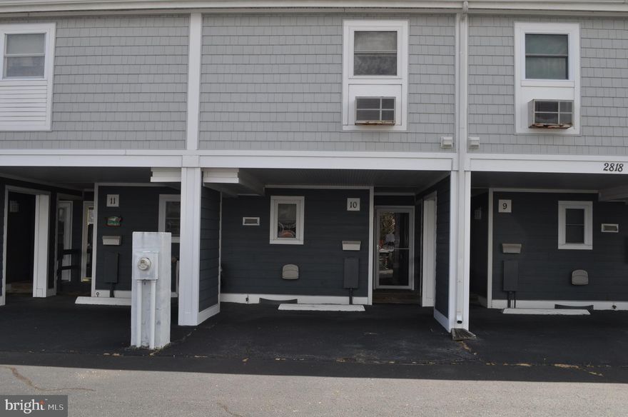 A Little piece of heaven awaits you.  Your Waterfront Beach Retreat and May Be One Of The Best-Kept Condo Complexes In Ocean City Welcome to Old Port Cove West Bayside waterfront beach retreat. Location is everything when it is close to all amenities, shopping, beach ,dining ,and amusement park. etc. FIRST TIME OFFERED, ORIGINAL OWNER. This unit is original per plans and specs. Kitchen has plenty of cabinets and a breakfast bar with all appliances convey. Living room has a vaulted ceiling, wood burning fireplace and spiral staircase.  While sitting in your living room you can look out onto your new Wolf PVC decking with vinyl railings and a gate for added privacy. Project was completed March 2019.  Don't forget about your assigned boat slip right in front of your deck, all you need is to bring your boat. Upper level is a large loft bedroom, full bath, his and her closets and laundry facilities. There is also a private salt water pool for those hot summer days and nights to relax by.  Private parking