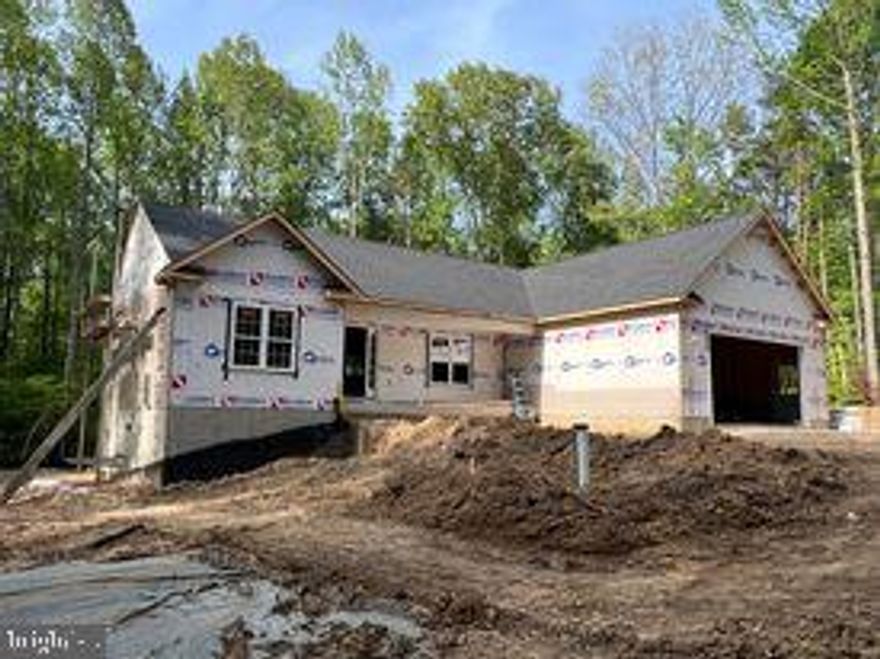 New Construction rambler on 10 acres with an unfinished walk out basement.  This home offers an open floor plan with the family room, kitchen and dining area.  3 bedroom 2 bathroom split bedroom design with a laundry room and a 2 car garage.  The basement is an unfinished walk out basement with rough in for a full bathroom.