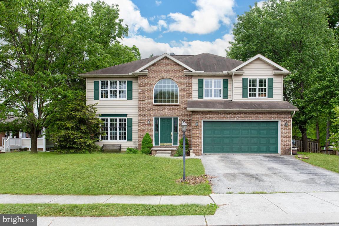 Welcome home to this charming brick-front Colonial offering 5 bedrooms, and 3.5 baths.
From the moment you step into the light-filled two-story foyer, you’ll appreciate the hardwood floors, classic wood staircase, and timeless character throughout. The main level features a formal dining room, a bright living room, and a cozy family room with a brick fireplace — perfect for gatherings. The kitchen offers ample cabinet space, a central island, and a breakfast nook overlooking the fully fenced backyard with mature trees and a playset, ideal for kids or entertaining.
Upstairs, you’ll find five generously sized bedrooms, including a spacious primary suite with an ensuite bath.
The partially finished basement includes a spacious family room, full bathroom, and a storage area.
This home offers solid construction, great bones, and opportunity!