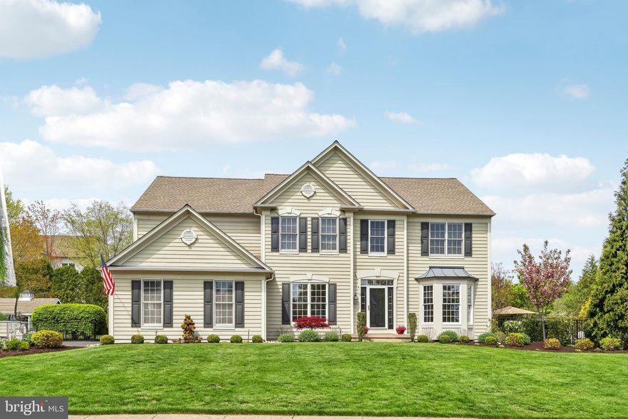 This beautifully maintained 4-bedroom, 2.5-bath home is nestled on a manicured lot in the award-winning Council Rock School District, within the sought-after Sol Feinstone Elementary and CR North High School. From the moment you arrive, the curb appeal is undeniable—lush landscaping, a side-entry two-car garage with custom flooring, and sidewalks that wind through this intimate, sidewalk-lined community.
Step inside to a bright two-story foyer that sets the tone for the home's warm, traditional style. Hardwood floors in a rich brown tone lead you through the main level, where you'll find a living room, dining room, versatile home office, a convenient laundry room, and a cozy family room featuring a fireplace and soaring ceilings.  The formal living room has been transformed into a one-of-a-kind sitting room, complete with built-in shelving and a copper-look ceiling—a space perfect for relaxed evenings with your favorite beverage and tunes or conversation with friends.  The kitchen offers both function and charm with granite countertops, stainless steel appliances, a double oven, a pantry closet, a desk area and a center island with pendant lighting. There is also an inviting eat-in area overlooking the enclosed porch and door to the backyard. Upstairs, all four bedrooms are generously sized, including a primary suite with a wall of windows, a bright neutral  bath with double vanities, a new frameless shower door, toilet closet, and a walk-in closet. The upper level also offers a remodeled hall bath that serves the secondary bedrooms.
The finished basement expands your living space with two seating areas,  a beautiful stone fireplace, recessed lighting and a custom bar—ideal for entertaining or play.  The true showstopper is outside: a backyard retreat with a covered patio, an inground pool and hot tub, outdoor speakers and an expansive lounging area designed for summer fun and weekend relaxation. The hardscaping and waterfall are stunning and you will feel like you are at a resort in your backyard. Strategic plantings provide privacy and a beautiful backdrop for this area. 
The location is ideal as you’re just minutes from downtown Newtown’s charming shops and restaurants, with easy access to Washington Crossing and Tyler State Park. Commuting is simple, whether you're heading to Yardley, New Hope, or across the river into New Jersey.  This is more than a home—it’s a lifestyle in one of Newtown’s most cherished locations.  Make your appointment to see this gorgeous home today.