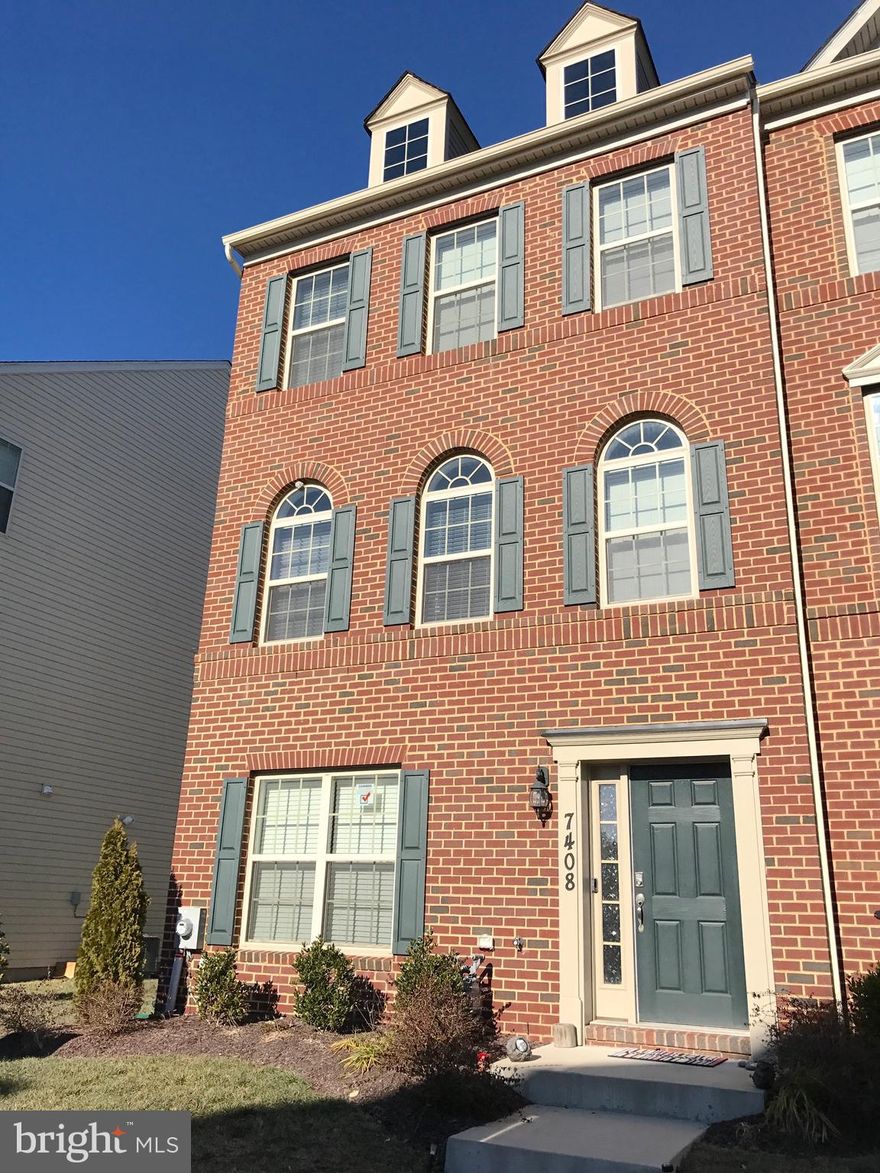 Bright and beautiful near new 3 bedroom, 3 bath END UNIT townhome with open floor plan boasts hardwood floors on main level, and a kitchen with granite countertops and stainless steel appliances. Rear entry garage gives access to lower level rec space and full bathroom. Master bath includes a double sink, shower, and soaking tub.