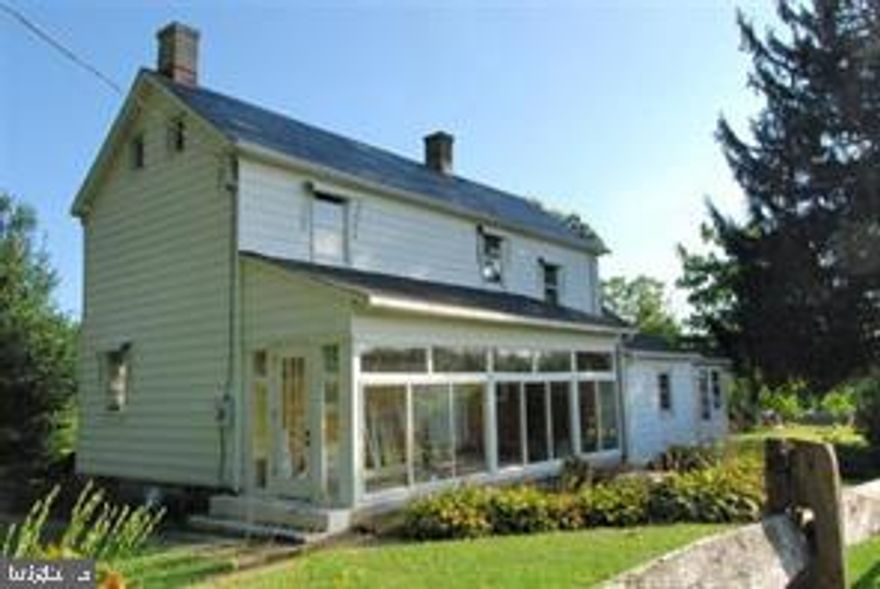 HOUSE IS UNDER RENOVATION AND IS BEING SOLD 'AS-IS, WHERE IS, NO WARRANTIES ARE EXPRESSED OR IMPLIED.  HOUSE SITS ON A .55 ACRE PRIVATE LOT.  IF YOU ARE LOOKING FOR A PROJECT, THIS IS THE HOUSE FOR YOU!