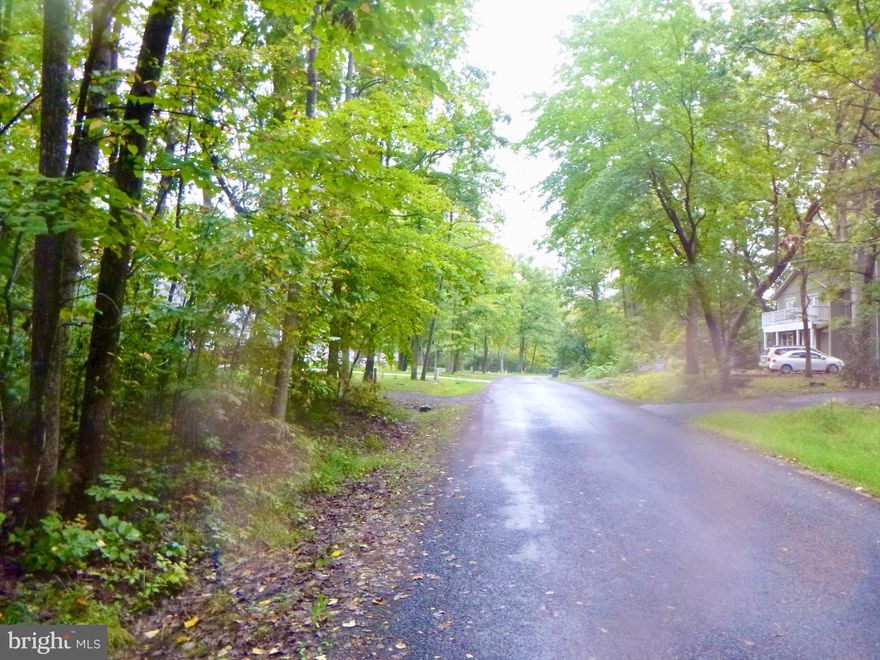 An excellent opportunity to build your dream home on this fantastic wooded lot in the popular Lake of the Woods Community! With only a few lots left, this is a great opportunity to become part of a vibrant lake community. Whether you’re ready to build now or simply want to enjoy the amenities and plan for later. This lot is conveniently located near the back private gate and near the Sweetbriar Pool and Community Center,

Lake of the Woods  Community has everything you could possibly want: a large 500+ acre main lake with marina for boating, skiing, and relaxing,  and a smaller 35-acre fishing lake. With nine sandy beaches, two Olympic-sized swimming pools, and plenty of walking and hiking trails, outdoor activities are endless. The community also features a Physical Fitness Center, tennis and pickleball courts, sports fields, and even an Equestrian Center and campground for residents/members only.. And don't forget an 18-hole PGA golf course with a Pro Shop and Café!

The Clubhouse offers casual and fine dining options, along with a Members' Lounge/Bar overlooking the lake. This friendly, relaxed community has it's own Fire Department, and an independent, multi-denominational church.

Conveniently situated between Fredericksburg and Culpeper, Lake of the Woods offers easy access to commuter parking, Virginia Rail Express (VRE), and Amtrak stations for travel to Washington, D.C., or Richmond, both about 60 miles away.