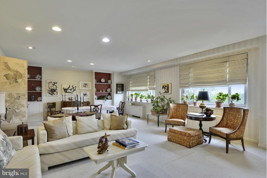 Stunning quiet corner unit bathed in sunlight and ready for new touches.  Wonderfully proportioned rooms with grand dimensions and space. Den with wall of built-ins, new windows throughout and covered porch.  Estate priced!  THIS IS A COOP, CASH ONLY CONTRACTS