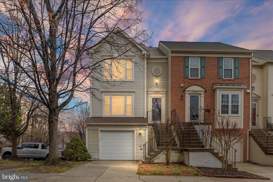 Updated end-unit townhome with 1-car garage in sought-after Dominion Station! This 3BR, 2.5BA home features numerous recent upgrades including updated baths (2022), windows (2022), HVAC (2023), and roof (2018). Bright and spacious layout with a large primary suite featuring vaulted ceilings and a walk-in closet. Fully finished walk-out basement with a cozy woodburning fireplace—perfect for additional living or entertaining space. Prime Sterling location close to shopping, dining, commuter routes, and more!