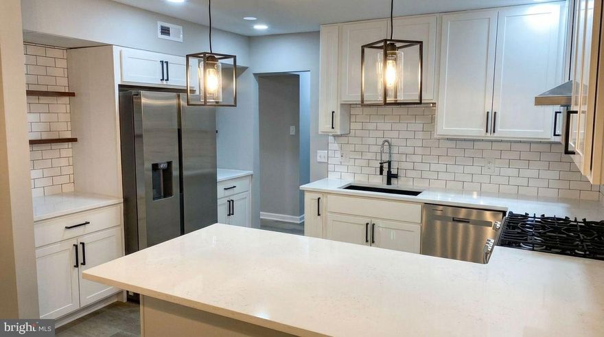 Beautifully Updated First-Floor Condo Offering Stylish, Move-In-Ready Living. The Open Kitchen features New Cabinets (2026), QUARTZ Countertops, Tile Backsplash, and Stainless Steel Appliances (2026), Perfect for both Everyday Living and Entertaining. Updated Bathrooms Complement the Home’s Fresh, Modern Feel. Enjoy New Flooring, New Lighting (2026), and Custom Paint Throughout. Large Windows Fill the Space with Abundant Natural Light. Water is Included in the COA Fee, and the Unit Comes with One Assigned Covered Parking Space. An Exceptional Opportunity for Comfortable, Low-Maintenance Living in a Convenient Location.