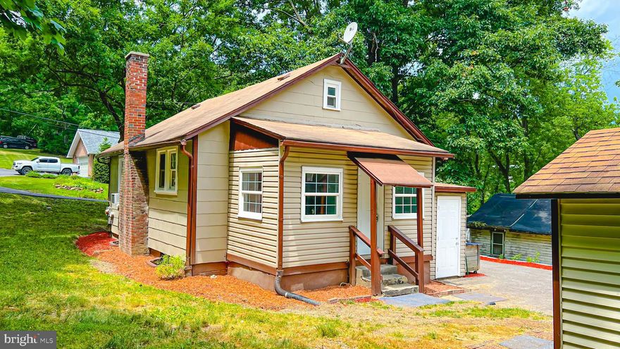 Nestled in the serene countryside, this house stands like a hidden gem, waiting for a touch of imagination to transform into a perfect retreat. Stepping inside the newly remodeled house reveals a world of possibilities. The living room invites cozy gatherings just waiting for your vibrant colors. The kitchen has brand new appliances. The air conditioners are brand new as well. The furnace is new. The finished attic is the second bedroom, The unfinished basement has access to the backyard and could make a fine play area for young children and private space for your teens. The large backyard is perfect for outdoor entertaining. Come look for yourself and let your imagination go wild.