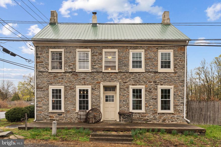 Timeless Bucks County Farmhouse on 1+ Acre in Pennridge School District
Escape to this captivating stone farmhouse, where historic charm has been lovingly preserved and enhanced with modern updates. Nestled on over an acre, this 4-bedroom, 2-bathroom home is the perfect rustic retreat. The inviting foyer sets the tone with barn board flooring, a coat closet, and a cozy book nook with built-in storage and a reading light. The heart of the home is a beautifully renovated eat-in kitchen, featuring stunning maple countertops, a tile backsplash, tile flooring, a deep stainless steel sink, and two ovens—one gas and one electric. Brand-new 2024 windows, recessed lighting, and exposed beams create a bright, welcoming space, while a gas fireplace insert adds warmth and character. Gather in the living room, where a wood stove offers alternative heating for the home, and a repurposed fireplace—now a charming rustic bookshelf—creates a cozy atmosphere. The first-floor bedroom, updated in 2020, features LVP flooring, a barn door, a stone and brick fireplace with a wood stove, and private exterior access—making it an ideal space for guests, a home office, or a future in-law suite. Just steps away, the circa-1700s workshop presents an exciting opportunity for renovation, including the potential to add a first-floor bathroom to the main level bedroom. Ascend the beautifully refinished black walnut stairs to the primary suite, which showcases a wooden accent wall, new carpeting (2023), and a beautifully crafted wooden bathroom with convenient laundry access. Two additional bedrooms are filled with natural light from deep window sills and showcase original barn board floors, along with fireplaces thoughtfully repurposed into unique storage areas. A full hall bathroom with a double vanity, tile flooring, a shower/tub combo, and a linen closet completes this level. The third-floor attic offers ample storage space. The spacious backyard, featuring peach, apple, and plum trees, along with a raspberry patch, offers plenty of room for entertaining, gardening, or enjoying the serene country setting. Additional features include newer windows (most replaced between 2016 and 2024), a newer shingle roof (2016), a steel roof (2008), and a sizable shed with recently added electricity. Easy access to Route 309 makes commuting a breeze. Don’t miss the opportunity to own this exceptional farmhouse—schedule your showing today!