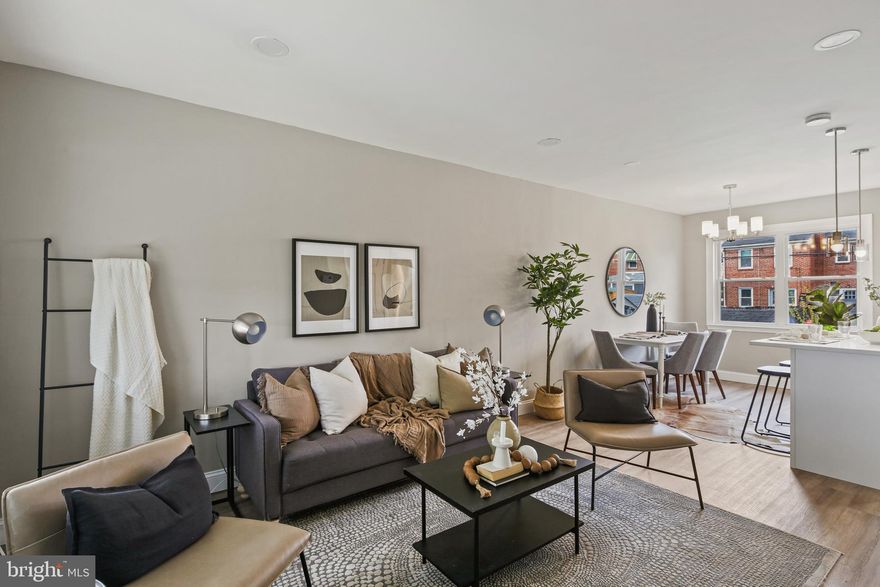 OPEN HOUSE APRIL 19 12-2PM 

Welcome home to this beautifully renovated townhouse.  The open concept floor plan is designed for your enjoyment.  The brand new kitchen features, stainless appliances, quartz countertops and an island with breakfast bar seating.    Two large bedrooms upstairs with a remodelled bathroom.  Finished basement offers a large family room and a second new full bath to expand the living area.      

 Spend time outside in the fenced yard or use the parking pad for a private parking space.  Sit on the front porch and enjoy the view of the park across the street.   Conveniently located near Eastern Ave and easy access to I-695 makes commuting a breeze. 

The HVAC system was just installed featuring central Air Conditioning.  All new LVP flooring and carpet plus fresh paint makes this house move in ready.  Just unpack and start enjoying your new home.