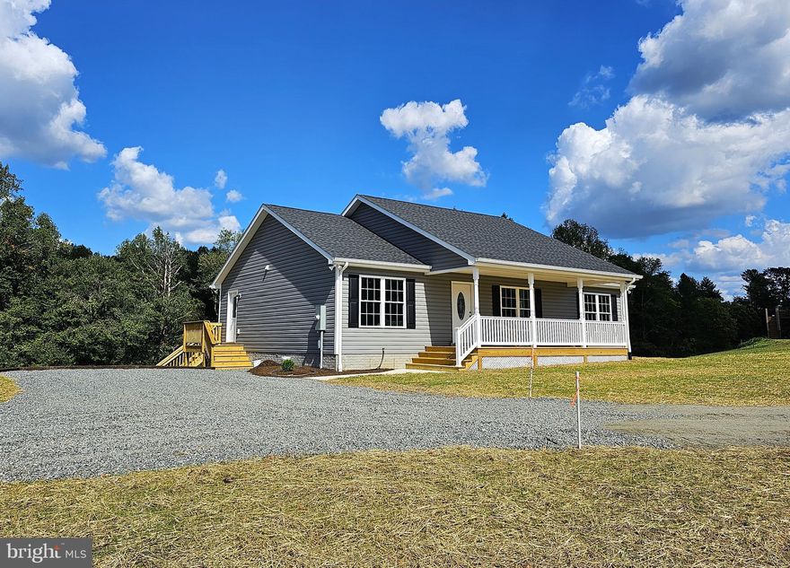 Opportunity to own a BRAND NEW home at an affordable price! Ranch style home boasts a split bedroom floor plan with 3 bedrooms, 2 full baths, beautiful luxury vinyl plank throughout, granite countertops, open concept great room with cathedral ceilings, separate laundry/mud room with pantry & more! Full walkout basement offers plenty of potential with space for rooms, rough-in plumbing & large windows along the back allowing in plenty of natural light. Enjoy the outdoors from the covered front porch or rear deck overlooking your peaceful, private setting. Quality craftsmanship & details show throughout with wide trim-work, rounded edge walls, upgraded finishes, etc. This adorable home is situated on 2.4+ acres just off Route 230 on the eastern side of the county, with an ideal location for traveling to the town of Madison, Orange, Culpeper &/or Charlottesville. Just Pack Your Things & Move Right In!!