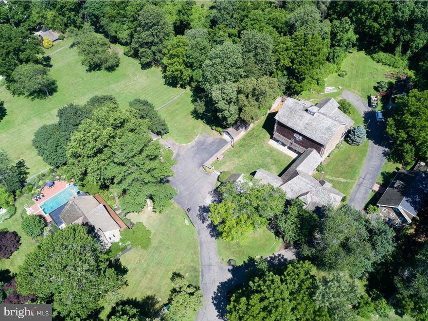 Once in a lifetime opportunity to own 16 acre estate in the heart of Radnor Hunt Country. This property consists of  3 residences and a barn.  Perfect for the serious equestrian, a multi generational family or the individual who craves the privacy that White Horse Farm offers. The Main house is a stone manor home with 7 bedrooms with four full baths and 2 powder rooms.  There are 3 bedrooms on the 2nd floor and 4 on the third floor.  This home is complete with enlarged & updated master suite, elegant entertaining spaces, fabulous pool area and a front porch that rivals any view in the area. For everyday living the kitchen, family room and bar provide great usable space. Huge 10 stall barn complete with tack rooms and hay storage. For the entertainer, there is a large party room with heat and his/hers rest rooms in the barn as well. There are 2 additional residences on the property. "The Creamery" is a 3 BR 2.5 bath home with exposed stone and wide open floor plan, Private location and spectacular views. With a first floor master it is great for in-laws. A separate basement entrance could be a great private office.  "The Cottage" is a 1/2 Bedroom space that has amazing views of the property. Could be used as a farm managers home, company headquarters or a rental property. The merits of this special property are too numerous to list, it must be seen to truly appreciate all that White Horse Farm has to offer.