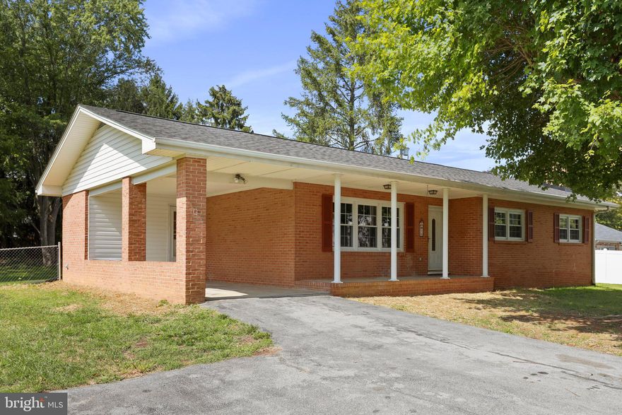 $30,000 price reduction! Don't miss out...this tastefully remodeled brick rancher presents a perfect blend of modern comfort and classic charm. Featuring 3 bedrooms and 2 full bathrooms. This home offers a peaceful setting on almost half an acre of land with NO HOA. Nestled within a peaceful neighborhood, you'll enjoy the close proximity to shopping, schools and conveniences. Enjoy cooking in your Brand New spacious kitchen with matching stainless steel appliances, white soft close cabinetry, and granite countertops. You'll also love relaxing in your screened in back porch overlooking the large backyard or drink your morning coffee on the front porch while watching squirrels play in the tree. Enjoy the cool nights ahead in front of your cozy fireplace in the finished basement rec room.  The unfinished portion of the basement gives you room to grow as you see fit, maybe a gym or extra storage space. Your options continue outside, with a shed that provides ample storage for outdoor equipment, ensuring your property remains pristine and organized. To complete this home a NEW 30 Yr Architecture shingled roof & NEW HEAT PUMP were just installed and it has been tastefully painted & NEW luxury vinyl plank flooring installed. You won't want to miss this one...call to schedule your private showing today!