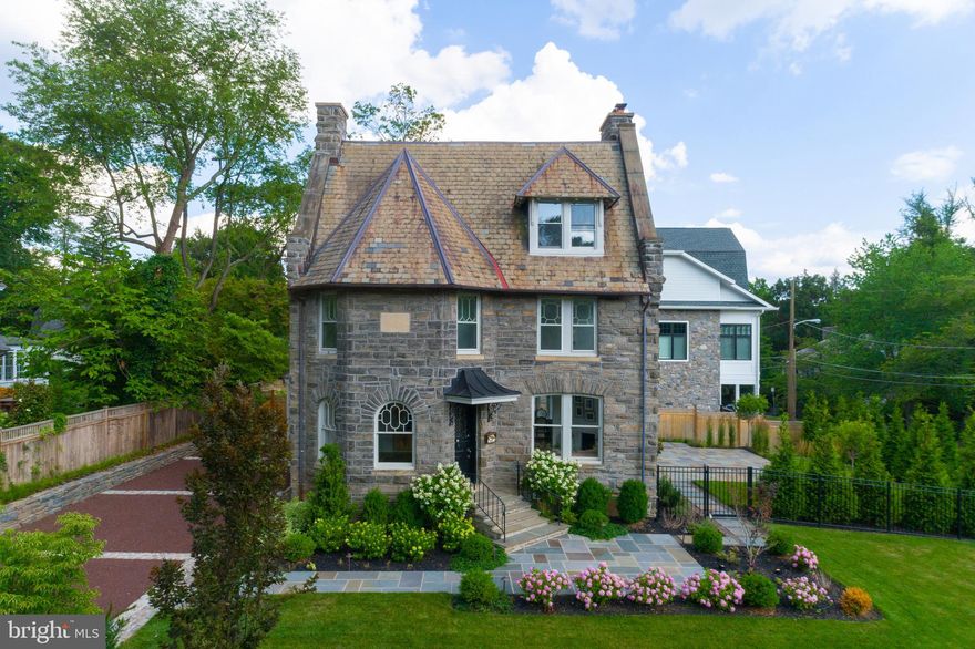 Welcome to 30 West Chestnut Hill Avenue - An historic restoration and renovation of a classic stone house in prime top of the hill location. This 5 BR/3 full plus 2 half BA late 19th century home features a recreated floor plan ideal for today's modern lifestyle.Inviting entry foyer with stone fireplace and original millwork is flooded with natural light. Light oak floors, large windows and white walls give this house a light and airy feel. Spacious living room with another fireplace and gorgeous new crown molding opens to a large dining room with fireplace and French doors opening to covered porch. A true chef's eat-in kitchen including Sub-Zero/Wolf appliances, chic black and white cabinetry, contemporary quartz countertops, island and bar area perfect for entertaining. Rear mud room with custom built-in cubbies and bench plus powder room complete this fabulous living floor. Ascend to the second floor with the luxurious master suite. Spacious MBR with 2 closets plus spa-lie en-suite marble BA, with oversized step-in shower with frame less glass door, double vanity separate water closet and radiant-heated floor. Large light filled guest room plus new hall bathroom and home office/sitting room completed this floor. Third floor features 2 additional guest BR's with adjoining full bathroom. New finished lower level is incredible additional living space. Spacious flexible room ideal for media room/playroom/ gym including wet bar and powder room.  Additional room with closet could make a guest BR or flexible living or storage room. With all new systems including new dual HVAC, plumbing, electric, tankless hot water heater and a modern floor plan this house has all the benefits of new construction coupled with all the original character and details of a historic Chestnut Hill house. Gorgeous new landscaping including flagstone patio and enclose yard perfect for dog lovers. Lovely new stone and gravel pathways and plantings. Short walk to the train, shops, markets, restaurants and cafes on Germantown Avenue. Convenient to Center City, major highways and the suburbs.  Truly exceptional.