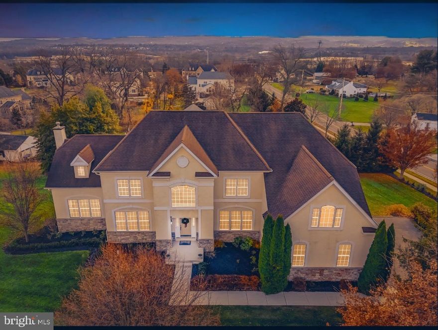 Welcome home to 2 Cannon Hill Lane.  This impressive 5 bedroom, 5-1/2 bathroom home offers all the space you have been searching for with multiple living areas including a finished walkout basement. Located in Upper Providence Twp., Spring Ford SD, minutes from downtown Phoenixville and easy access to 422, this single-family home is undeniably a winner in an impeccable neighborhood! Enter this stately home through a grand foyer with a formal living room to your left and a large dining room to your right – both with French doors adding to the upscale feeling.  The dining room, with chair rail and crown molding, opens to a very spacious chef’s kitchen with endless counterspace, warm wood cabinetry, double ovens and a large sunroom/breakfast room with access to your private, recently refreshed, cedar deck overlooking a large, scenic backdrop.   This space is perfect for large family gatherings or entertainment, you can choose to dine in or out!  Adjacent and open the kitchen is sizable and has an adjoining step down family room with a gas fireplace, perfect for movie nights or cuddling up with a good book.  Perfectly located behind the kitchen and living areas you will find a large, private office, guest retreat or in-laws quarters with an ensuite full bath.  The private powder room and separate laundry room complete the first floor. The second floor boasts a stunning primary suite with a sunlit sitting room, and an ensuite full bath with a private water closet, soaking tub and two separate vanities.  There are also two walk-in closets in the primary bedroom to complete this dream retreat.  This level also offers three more spacious bedrooms, one has its own ensuite full bath, while the other two share the full hall bathroom with tub/shower combo for a total of 3 full baths on this level, and 5-1/2 bathrooms in the home! The finished lower level offers desirable walk-out access and adds even more living space to this already incredible home, perfect for game day, game night or a place to escape. This fabulous space hosts a large gathering room, a private room with endless options as well as a full bath.  There’s even the potential for a secondary kitchen, with a full sink and cabinets and electric line for an additional oven. In addition to 2 zone heating and cooling, thoughtful design using 2x6 lumber and extra insulation on exterior walls makes this home very energy efficient.  2 Cannon Hill Lane is an incredible find with a total of 4042 square feet plus the finished basement and a 3 car side entry garage equipped with both a gas line and 220 electric outlet.  Located in the Spring Ford School District, this home is situated on close to 1 acre offering peace and privacy, but with convenience to everything!  You can choose to dine or shop at the Providence Town Center, as well as conveniently located close to downtown Phoenixville with its many festivals, shops and restaurants.  Make your appointment today for a private tour of this one of a kind home!