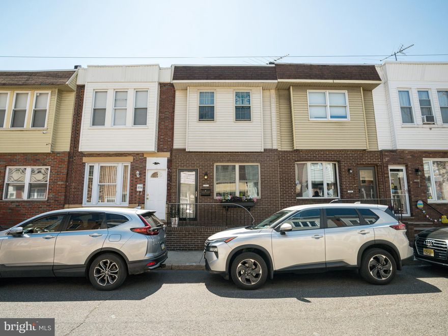Welcome home! This beautifully renovated 2 bedroom 1.5 bath townhome is nestled on a quiet block in the Whitman section of South Philly. Step inside from the charming brick patio into a bright open concept layout that blends style and comfort. The living room flows seamlessly into the generous kitchen finished with shaker cabinets, leathered granite countertops, tile backsplash, gooseneck faucet and stainless steel appliances. Adjacent to the kitchen, the dining area offers the perfect setting for entertaining. The hardwood floors extend upstairs where you will find  2 full bedrooms and a large 4 piece bath with gorgeous modern tile. The fully finished basement expands your living space with endless possibilities—ideal for a home office, family room, guest suite, or workout area.  A half bath, laundry room and storage closet complete the lower level. Out back enjoy the quaint patio for grilling. Located just minutes from public transportation, the Columbus Blvd and Oregon Ave commercial corridors and major highways, this home offers both comfort and convenience in a prime South Philly location.