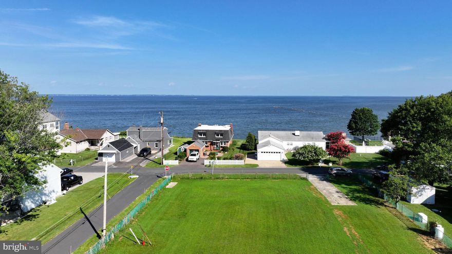 Fantastic corner lot across the street from waterfront homes .  Come and build your home with potential views from multiple levels of the Chesapeake Bay.  The lot is cleared and level.  Zoned R2.  Buyer is responsible for due diligence. Seller's conversations with the county indicated that there are no environmental features that would complicate the development of this legal lot. Originally subdivided and recorded in Plat book 21, Page 42.  Well water and AA Co./Mayo Public Septic The community of Saunders Point offers a small beach area with sweeping views of the bay.  Residents are welcome to launch kayaks or paddle boards from this site as well.   On the other side of the community is a  separate playground area  $20 per year HOA fee plus a $194.44 Reserve Fee. The community is surrounded by water and is located next to two county parks - Mayo Beach Park and Beverly-Triton Nature Park - both of which are within walking distance and offer various amenities such as hiking trails, beaches, fishing, cartoon launches, and indoor event space. Blue Ribbon Schools.  Fantastic opportunity!