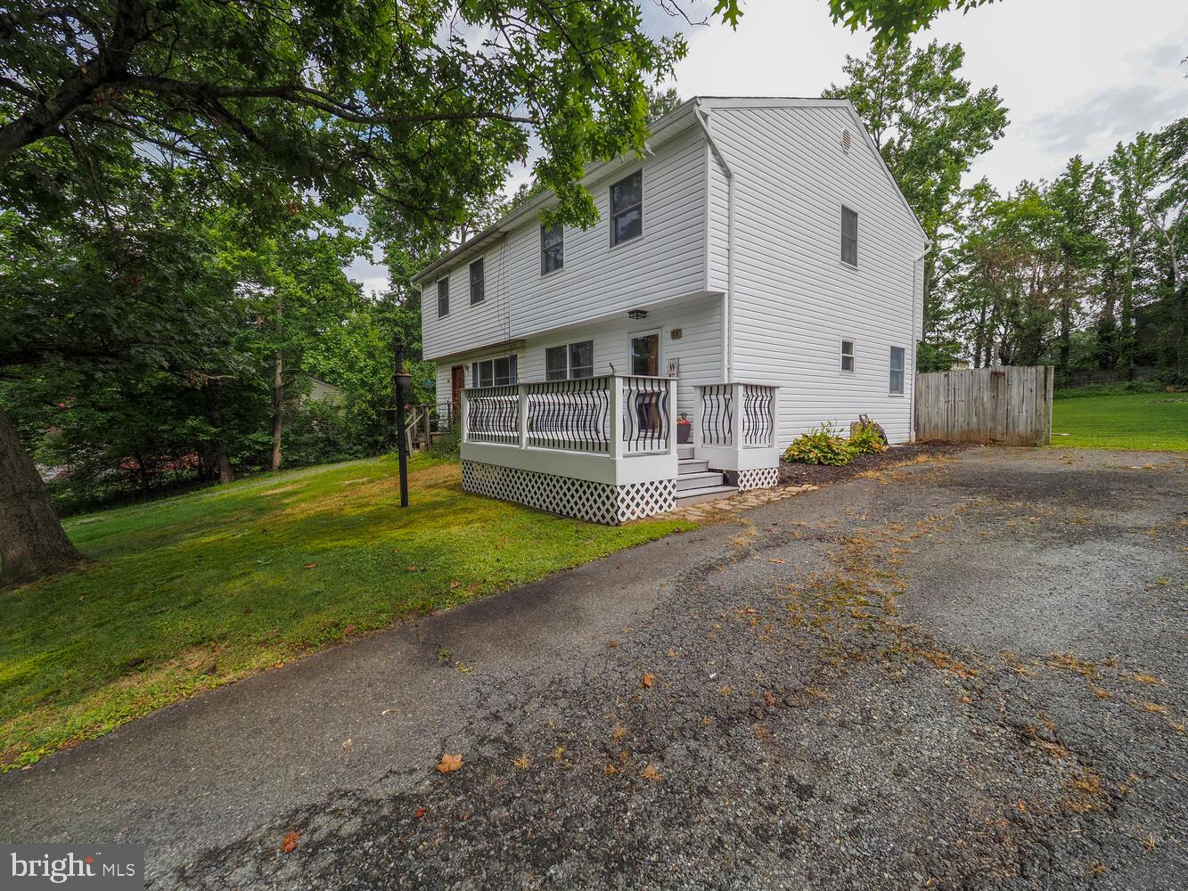 Rarely available semi-detached home in DeLaPlaine Manor, featuring an oversized yard and updates!
Updates include: Architectural roof, fully renovated kitchen down to the studs, heat pump/central air, vinyl siding, soffits, doors, a custom-built shed, Trex deck, washer/dryer, sump pump , and the refrigerator have all been updated within the last 8 years. The spacious lower level is ready for your finishing touches to add even more living space. Spacious fenced in yard. This one won't last long!