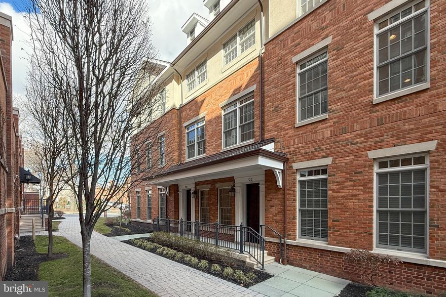 With a lofty feel, southern exposure and a quietly tucked-away position, this like-new townhouse feels refreshingly different from most of its Residences at Palmer Square neighbors. Follow a tree-lined walkway to the covered entrance, where a private elevator awaits in the tiled foyer. Large rooms with 9-foot ceilings and sunlight galore spread out above. Come evening, the glow of a double-sided, gas fireplace can be enjoyed from both the living room and dining room. While every cuisine imaginable - from gourmet tasting menus to locally made ice cream - is within a block or two, home cooks will still be eager to put the suite of Viking appliances to use. Ample counter space, a walk-in pantry and an openly adjoining family room/breakfast area are in line with what one might expect of a single-family home. Upstairs, all three bedroom suites are generously sized with organized walk-in closets and flawless wood floors. Each marble tiled bathroom is spotless and offers a deep tub for long soaks. Being in the epicenter of bustling Princeton makes a car-free lifestyle a real possibility, but reserved parking in the on-site garage is always available.  Some photos are virtually staged.