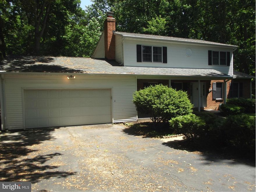 This is the home you have been looking for! Lots of privacy with almost 1.5 acres. Home is in pristine condition. 4 BR/ 2.5 BA, Spacious kitchen recently renovated, formal dining, living room and family room with brick fireplace. Built-in bookshelves. Hardwoods throughout. 2 car garage is over sized to fit a workshop along with your vehicles. Conveniently located off of Old Bridge Rd.