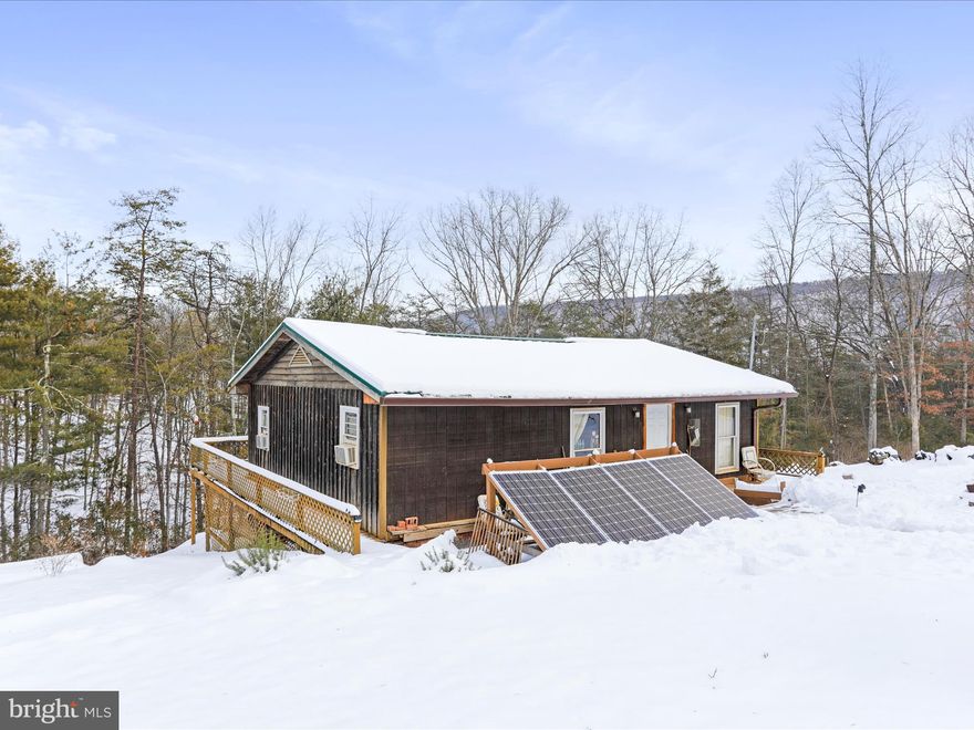 Rustic Cabin Retreat in Scenic Hampshire County, WV! Escape to this stunning 4.02-acre property nestled in the mountains of the Short Mountain Heights Subdivision near Delray, WV. Just a 2-hour drive from Washington, D.C., this rustic cabin offers the perfect blend of convenience and seclusion in beautiful Hampshire County. This cozy cabin features 2 bedrooms and 1 full bathroom, with electric baseboard heat and a wood stove providing year-round comfort. A backup solar system ensures you’ll never be without power, offering peace of mind no matter the season. The property includes a well-maintained access road for easy navigation and is enhanced by several strategically placed hunting blinds with a proven track record of success. Adding to the property’s appeal is a 336 sq. ft. storage building/accessory unit, perfect for storing tools, outdoor equipment, or accommodating hunting buddies. With two adjoining lots totaling 4.02 acres, this property is a haven for hunting, hiking, or simply immersing yourself in nature’s beauty. Located near Short Mountain Wildlife Management Area, Nathaniel Mountain WMA, and North River, this property is an ideal launchpad for outdoor recreation. Whether you’re seeking a peaceful getaway, a hunter’s paradise, or a basecamp for adventure, this property has it all. Don’t miss the chance to own your slice of West Virginia heaven!