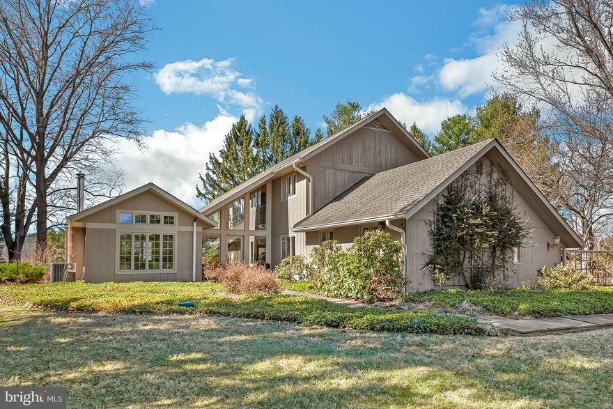 This striking 4-bedroom contemporary home is a true architectural gem, set on 10 sweeping acres of rolling meadows, mature trees, and peaceful privacy in Solebury Township. With an emphasis on light, space, and nature, virtually every room features floor-to-ceiling windows, creating an immersive connection to the outdoors while maintaining a warm, modern elegance inside.  <<---->>  

From the moment you step inside the two-story foyer, you’re greeted with custom floor-to-ceiling windows that flood the slate-inlaid white oak floors with natural light and frame sweeping panoramic views and open skies. Welcoming you further in is a spacious living room with a beamed and vaulted ceiling, natural stone fireplace and stunning views in every direction.  <<---->>  

The open-concept main living area is designed for both comfort and sophistication, anchored by  modern architectural lines, a thoughtful floorplan, and breathtaking views. At the heart of the space is a state-of-the-art kitchen, fully equipped with custom cabinetry and an oversized island that invites gathering and entertaining. A guest bedroom and full bath round out a first floor filled with natural materials, curated finishes, and effortless indoor-outdoor living.  <<---->>  

Upstairs, each of the three spacious bedrooms serve as personal private retreats with a modern and peaceful ambience. The primary suite is a true sanctuary, offering jaw-dropping views, a walk-in closet and spa-quality amenities that include a relaxing soaking tub, walk-in shower, and private deck access overlooking your beautifully designed in-ground pool and surrounding landscape.  <<---->>  

Beyond the main home, the property includes a 2-car garage and a 5,000+ sq ft pole barn—a dream space for car collectors, artists, woodworkers, or anyone in need of substantial storage or workspace. The versatility of this structure opens the door to countless lifestyle possibilities.  <<---->>  

Situated just minutes from both Doylestown Boro and New Hope, you’ll enjoy all of the shopping, dining, riverfront charm, and rich cultural history each has to offer—All within the award-winning New Hope-Solebury School District.  <<---->>  

Don’t miss your chance to own a rare blend of luxury, privacy, and natural beauty—schedule your private tour today.