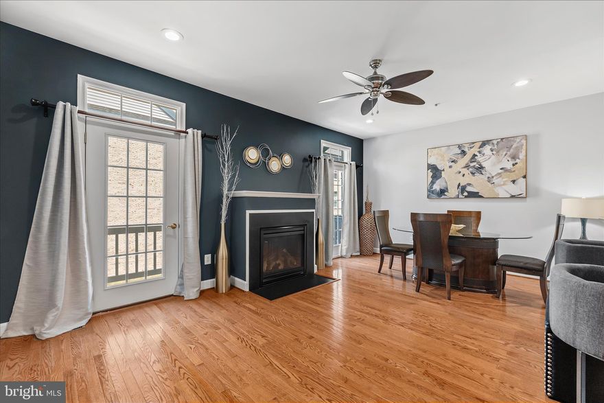 A Place You Can Truly Call Home!

Welcome to this beautifully appointed three-level home offering the perfect blend of space, comfort, and convenience. Nestled in the sought-after Summerfield community, this residence is just a short stroll (under 10 minutes) to the Morgan Boulevard Metro Station.

The entry level welcomes you with a versatile den—ideal for a home office, guest space, or additional living area—enhanced by elegant crown molding. A convenient half bath and direct access to the spacious two-car garage complete this level.
This well-designed home features 3 bedrooms, 2 full baths, and 2 half baths, thoughtfully arranged for modern living.

The second level showcases an open-concept layout perfect for both everyday living and entertaining. The dining area opens to a private balcony, creating the ideal setting for relaxing or hosting guests. The kitchen is equipped with granite countertops, stainless steel appliances, an oven, and a pantry—offering both style and functionality. A cozy fireplace adds warmth to the living space, while an additional half bath provides extra convenience.

Upstairs, the third level serves as a private retreat. The spacious primary suite features a luxurious en-suite bathroom with a  shower and Jacuzzi tub. Two additional bedrooms, a full bath, and a conveniently located laundry room complete this level.

Recent updates include fresh interior paint (2024), a new air conditioning system (2021), and a water heater replacement (2019). The carpet remains in excellent condition.

Ideally located near major highways and Metro access, this home offers unmatched convenience. Residents enjoy community amenities such as a pool, gym, and clubhouse. You’ll also appreciate being just minutes from Woodmore Town Centre and Wegmans, along with a wide array of shopping, dining, and entertainment options. Don't miss the opportunity to own this outstanding property.