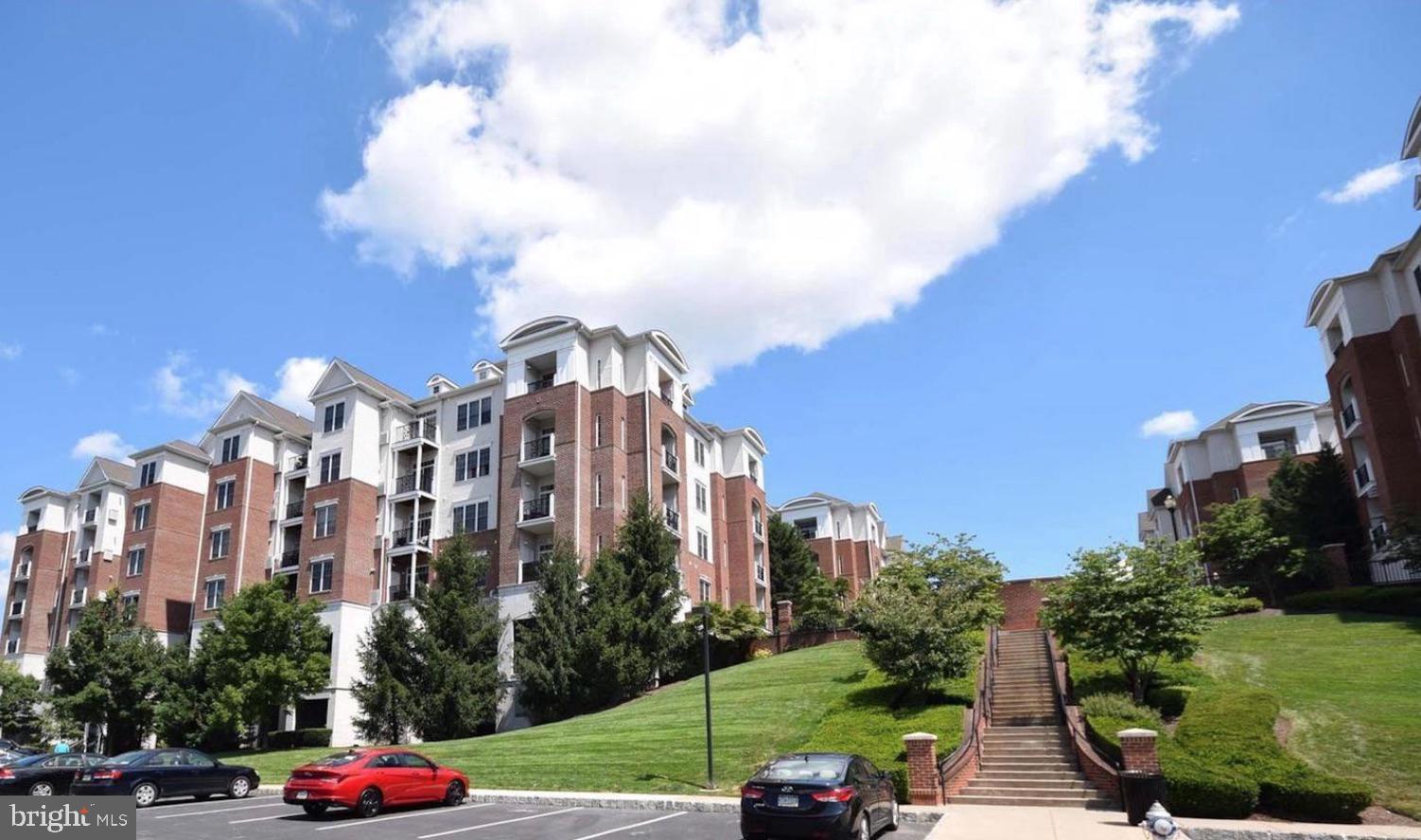 Welcome to The Grande at Riverview, one of Conshohocken’s most desirable communities, offering a truly carefree lifestyle right in the heart of downtown. This beautifully maintained Chanticleer Model is located on the second floor and overlooks the community’s serene swimming pool, complete with a patio area and locker room—perfect for relaxing or entertaining. Just steps from the Schuylkill River Trail, you can bike to Philadelphia or Valley Forge, or simply stroll to nearby restaurants, shops, nightlife, and the train station. The community also features BBQ areas, a secure parking garage with an assigned space, and fully secured entry systems for peace of mind. Inside, the condo boasts an open floor plan with 9’ ceilings, large windows that flood the space with natural light, and neutral tones throughout. The kitchen is outfitted with 42” cabinets, granite countertops, gas cooking (a chef’s favorite), built-in microwave, dishwasher, garbage disposal, pantry closet, and a breakfast bar. The living and dining areas are perfect for hosting, while the spacious bedroom features a large walk-in closet. The pristine bathroom includes a ceramic tile surround and a tub/shower combination with a wide vanity. Additional highlights include freshly painted walls, new carpet in the living room, and a convenient stackable washer and dryer. Best of all, you’ll have access to a state-of-the-art fitness center right on site—so cancel that gym membership and settle into effortless living on the river.